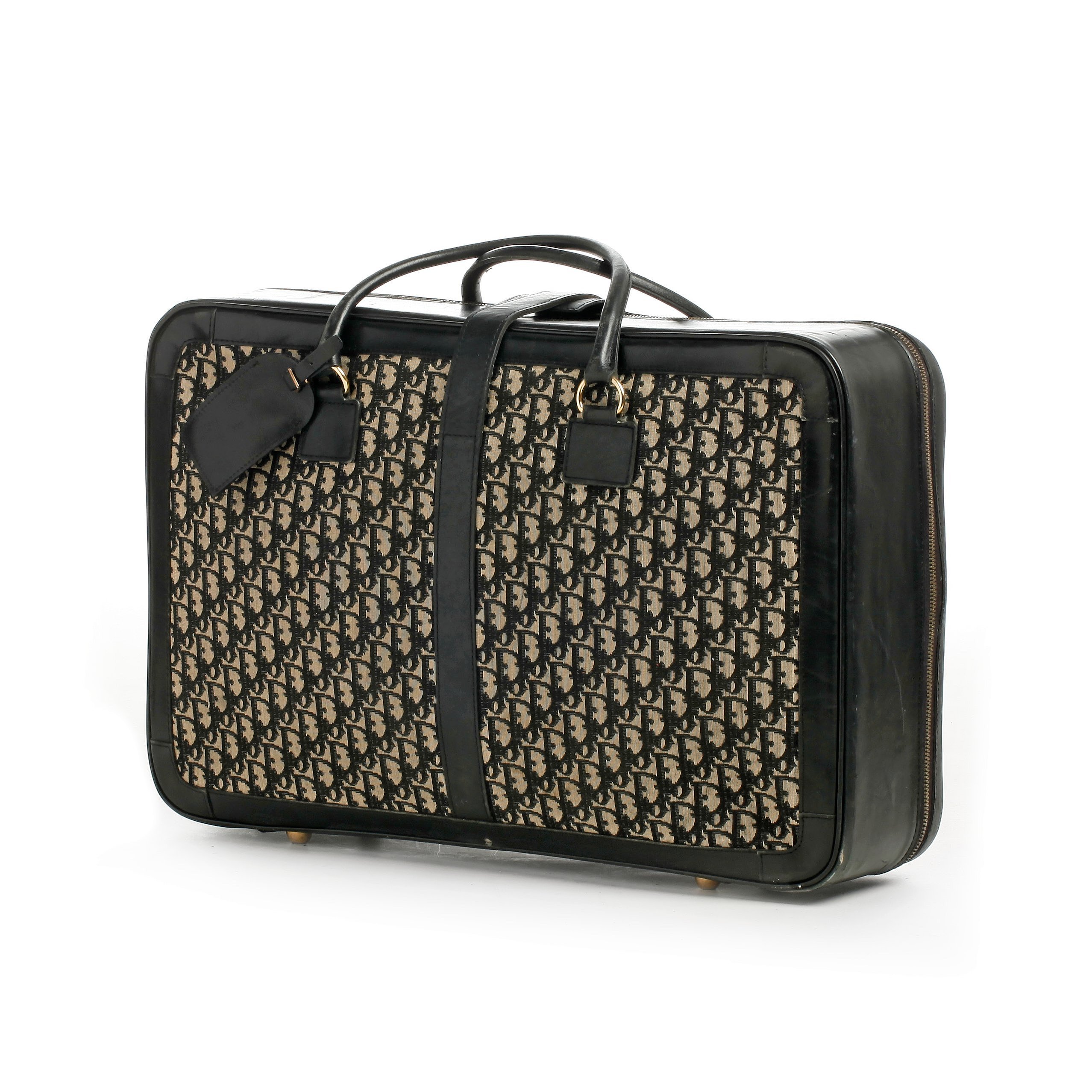 CHRISTIAN DIOR, a black monogram canvas travelling bag. Bukowskis