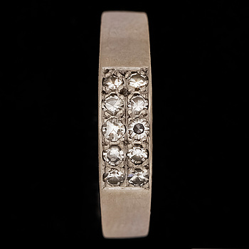 363958. RING, 18k vitguld med åttkantsslipade diamanter tot ca0,20ct. Cedstam, Stockholm, 1981. Vikt 3,4g.