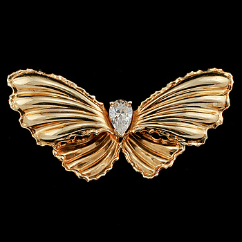 397742. BROSCH, 18k guld med fasettslipat glas, importstämplad, 1900-talets tredje kvartal. Vikt 5 g.