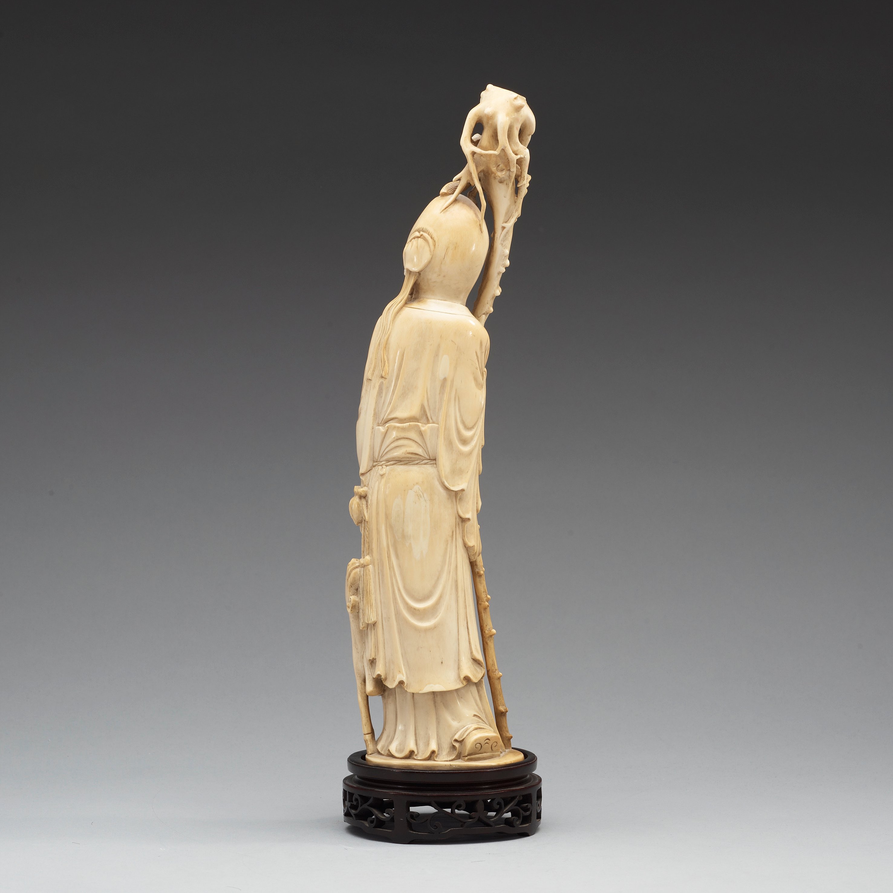 A carved ivory sculpture of Shoulao, Qing dynasty, 19th Century