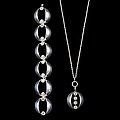 ELIS KAUPPI, A PENDANT AND A BRACELET, silv...