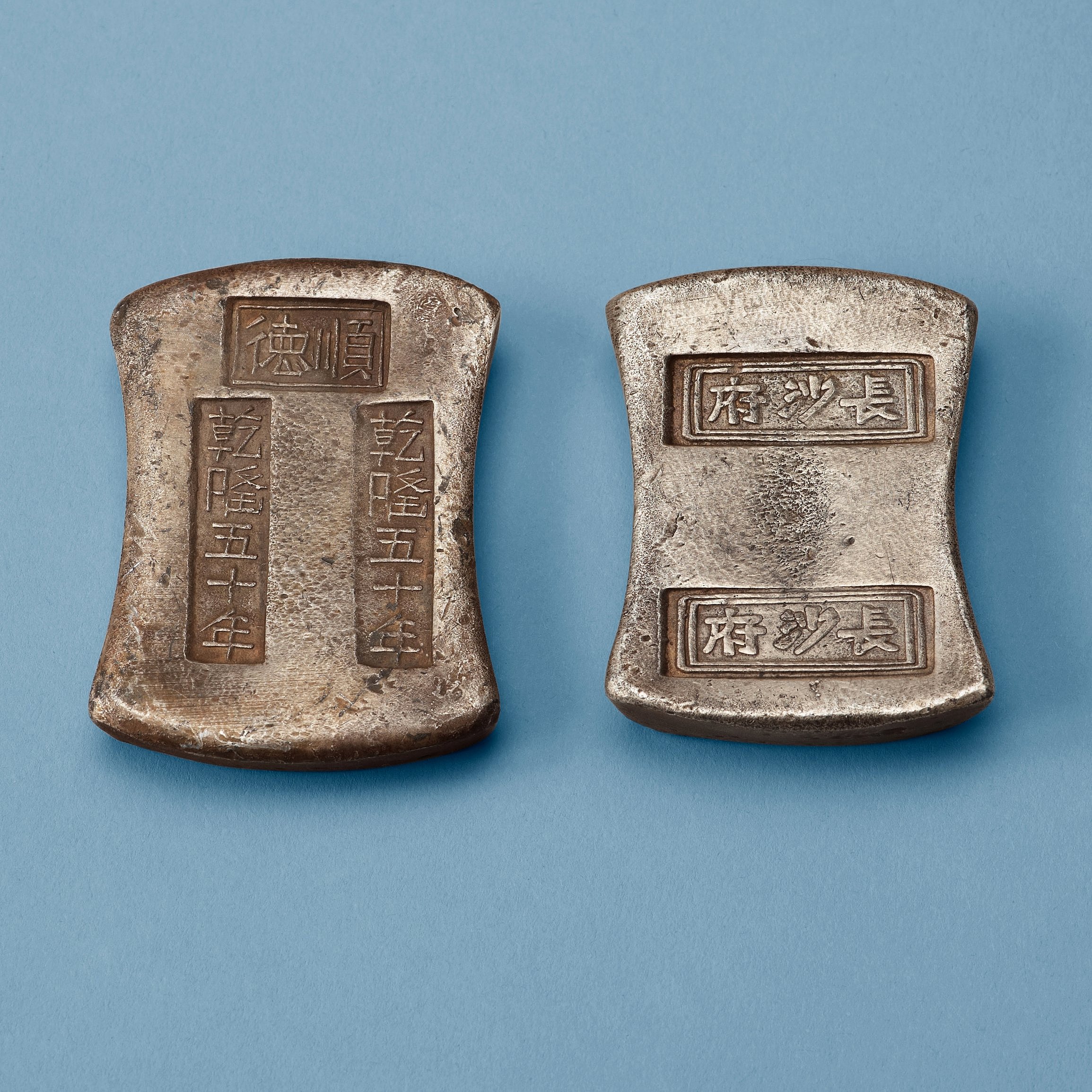 Two silver ingots, Qing dynasty. - Bukowskis