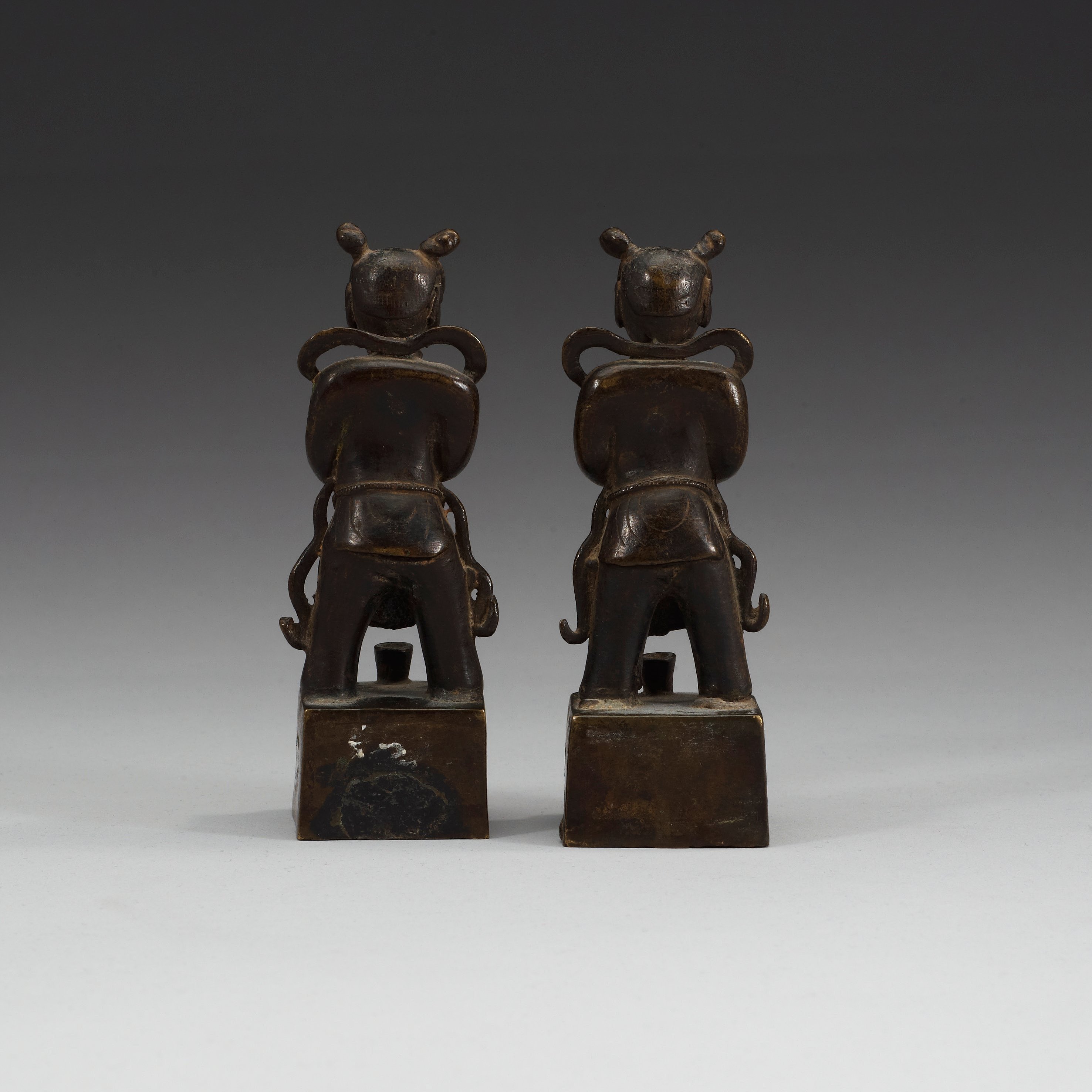 A pair of bronze joss stick holders, Qing dynasty. Bukowskis