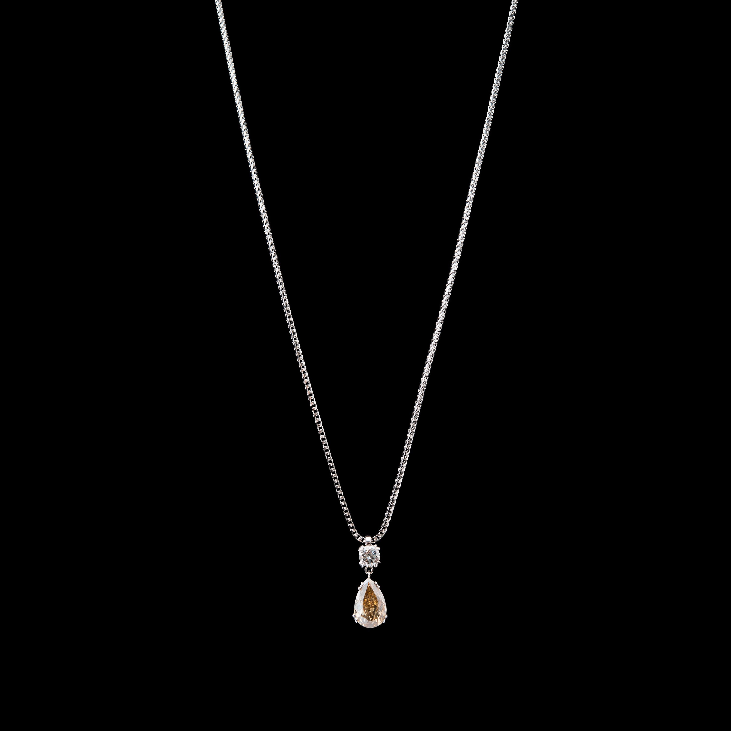 A PENDANT, drop cut diamond c. 2.00 LYB/Si2, brilliant cut diamond c. 0