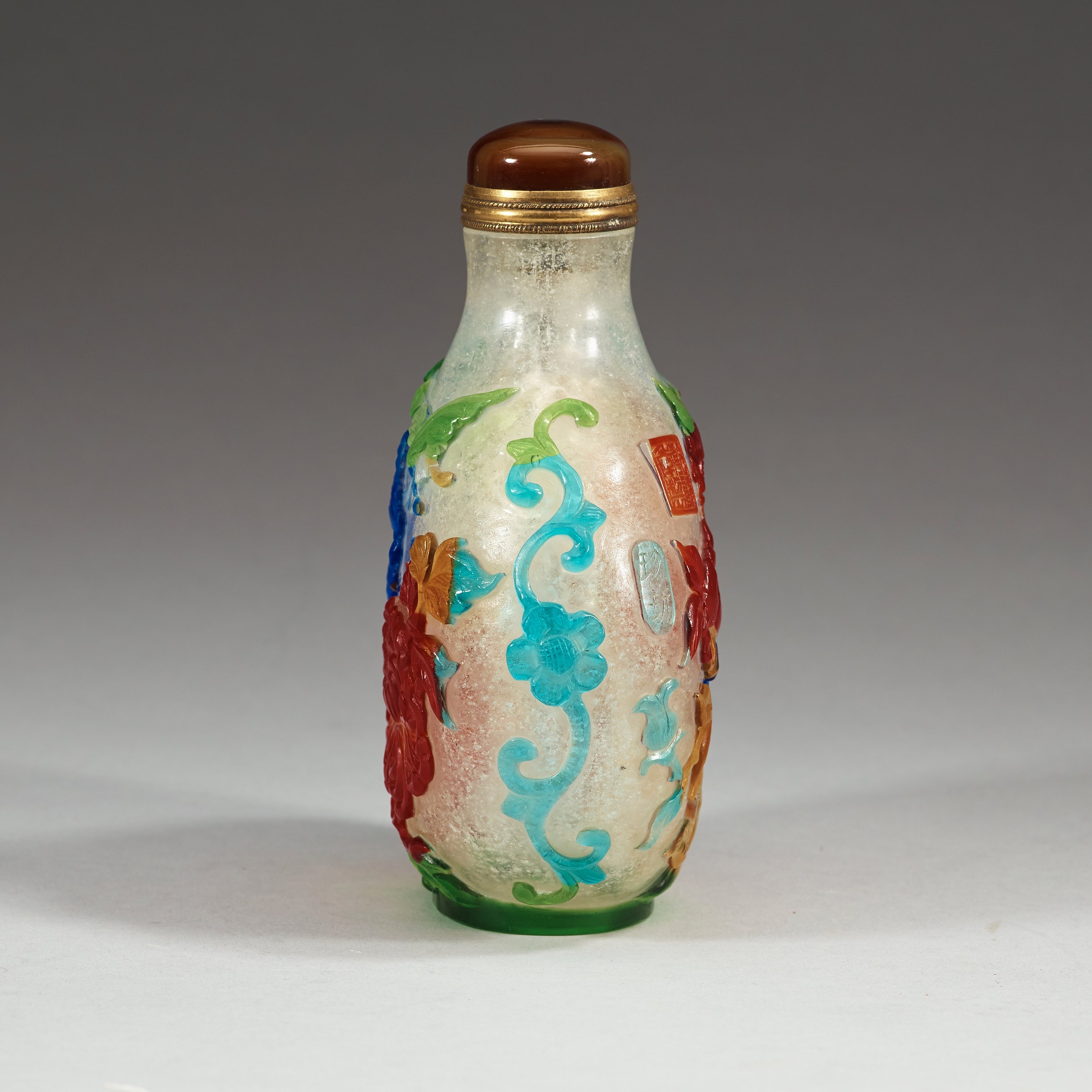 A large Chinese Peking glass snuff bottle with stopper, seal mark to