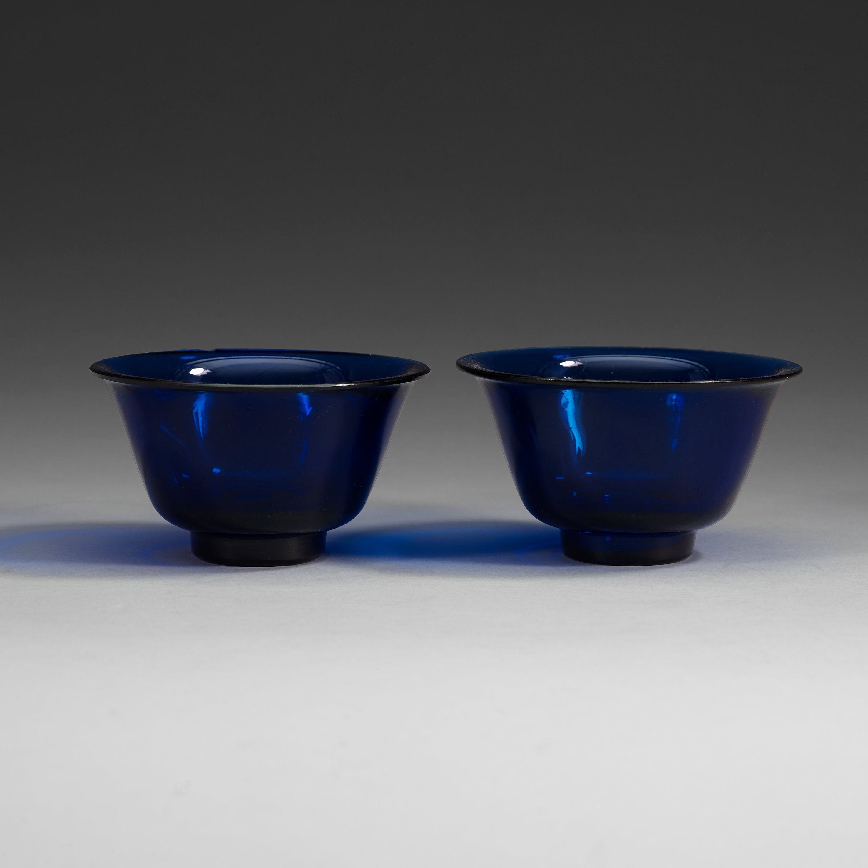 Two blue Peking glass bowls, late Qing dynasty. Bukowskis