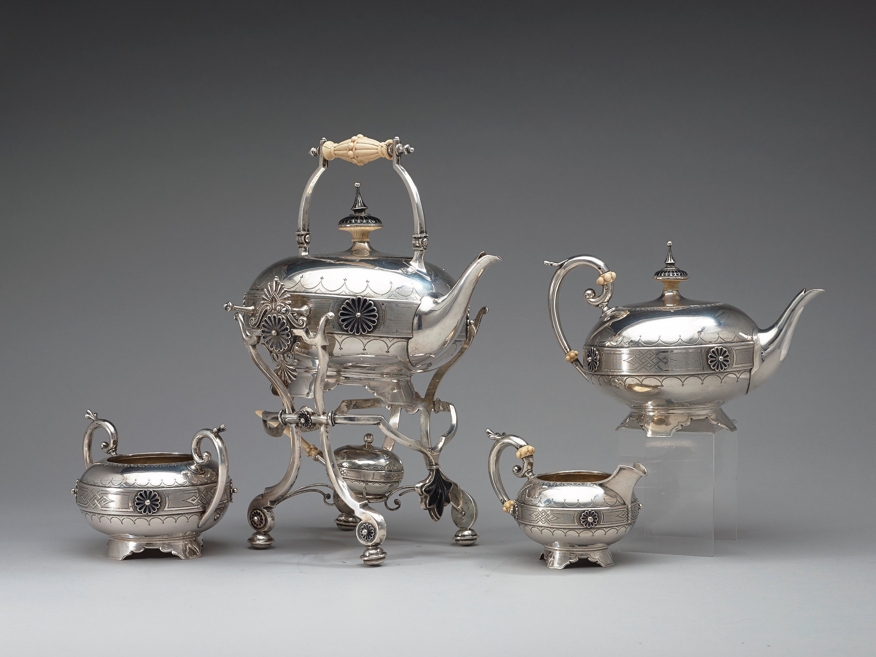An Austrian late 19th century five piece silver and enamel teaset