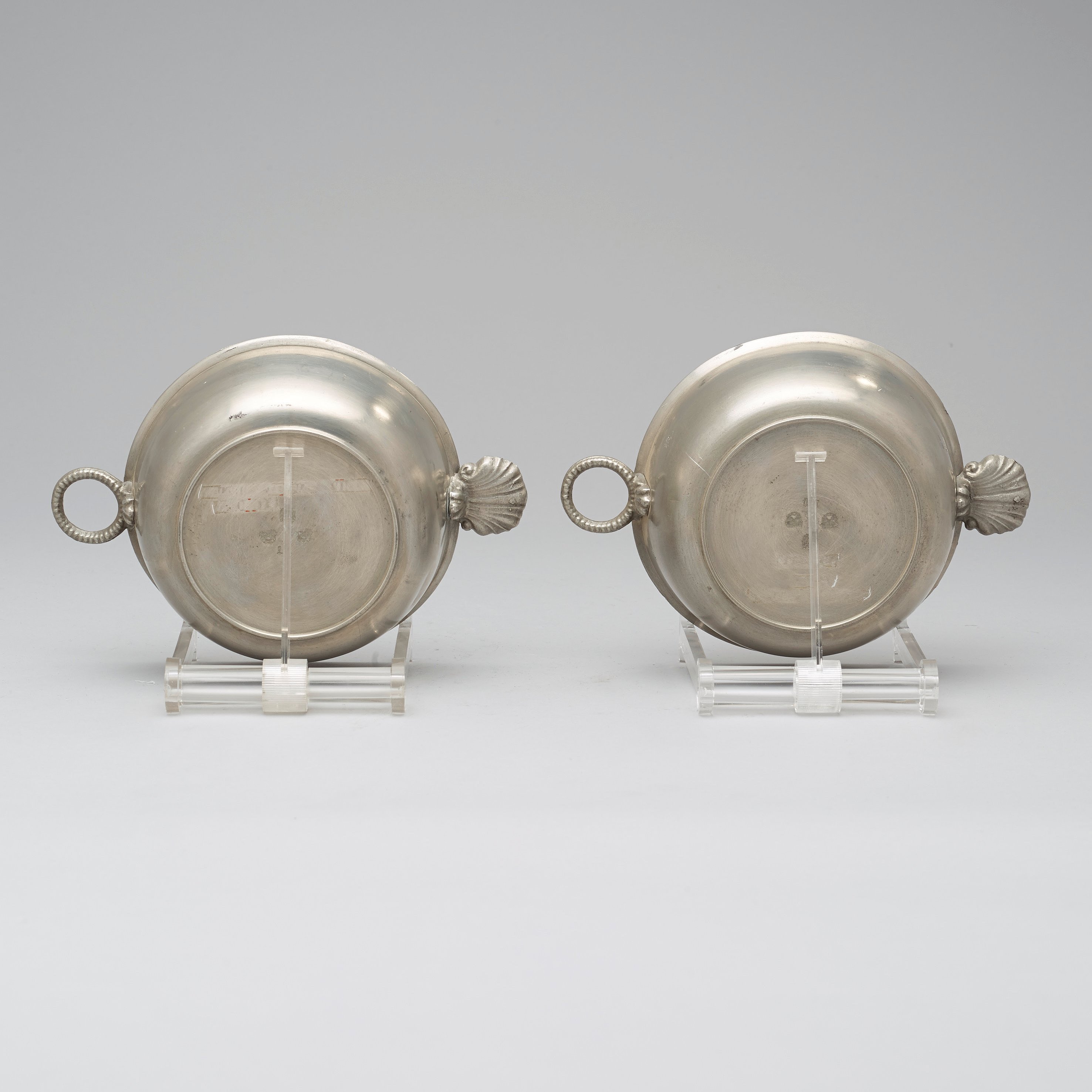 A pair of pewter food holders by M Leffler 1841. Bukowskis