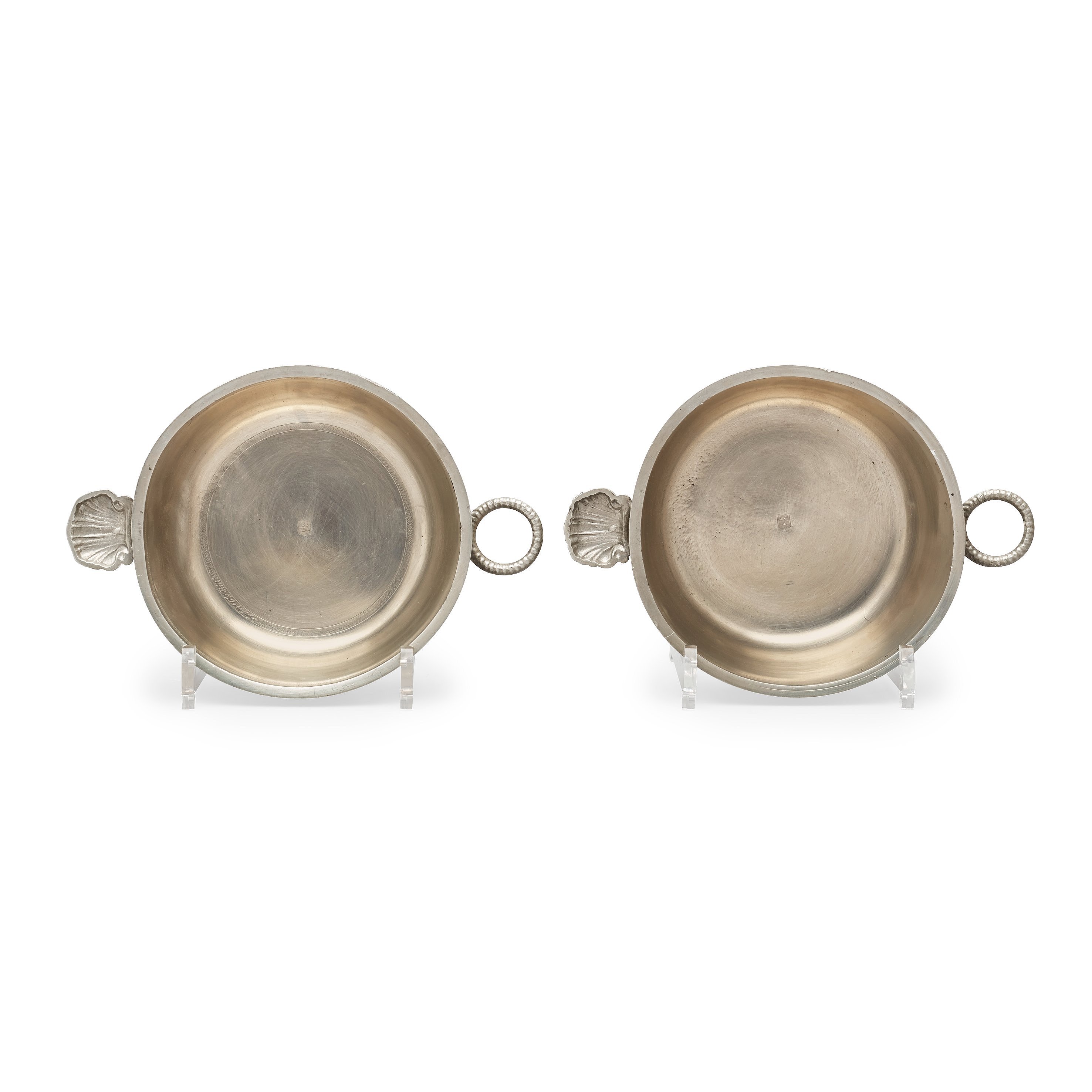 A pair of pewter food holders by M Leffler 1841. Bukowskis