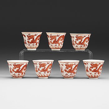 71. A set of seven five clawed dragon cups, Qing dynasty, four with Tongzhis six character mark and period (1862-1874) and.