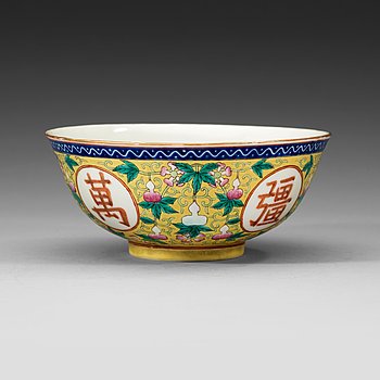 100. A famille rose yellow ground bowl, Qing dynasty, Guangxu six-character mark and of the period  (1875-1908).