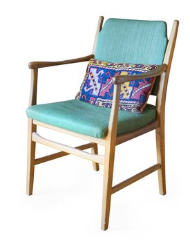 25. A PINE EASY CHAIR,