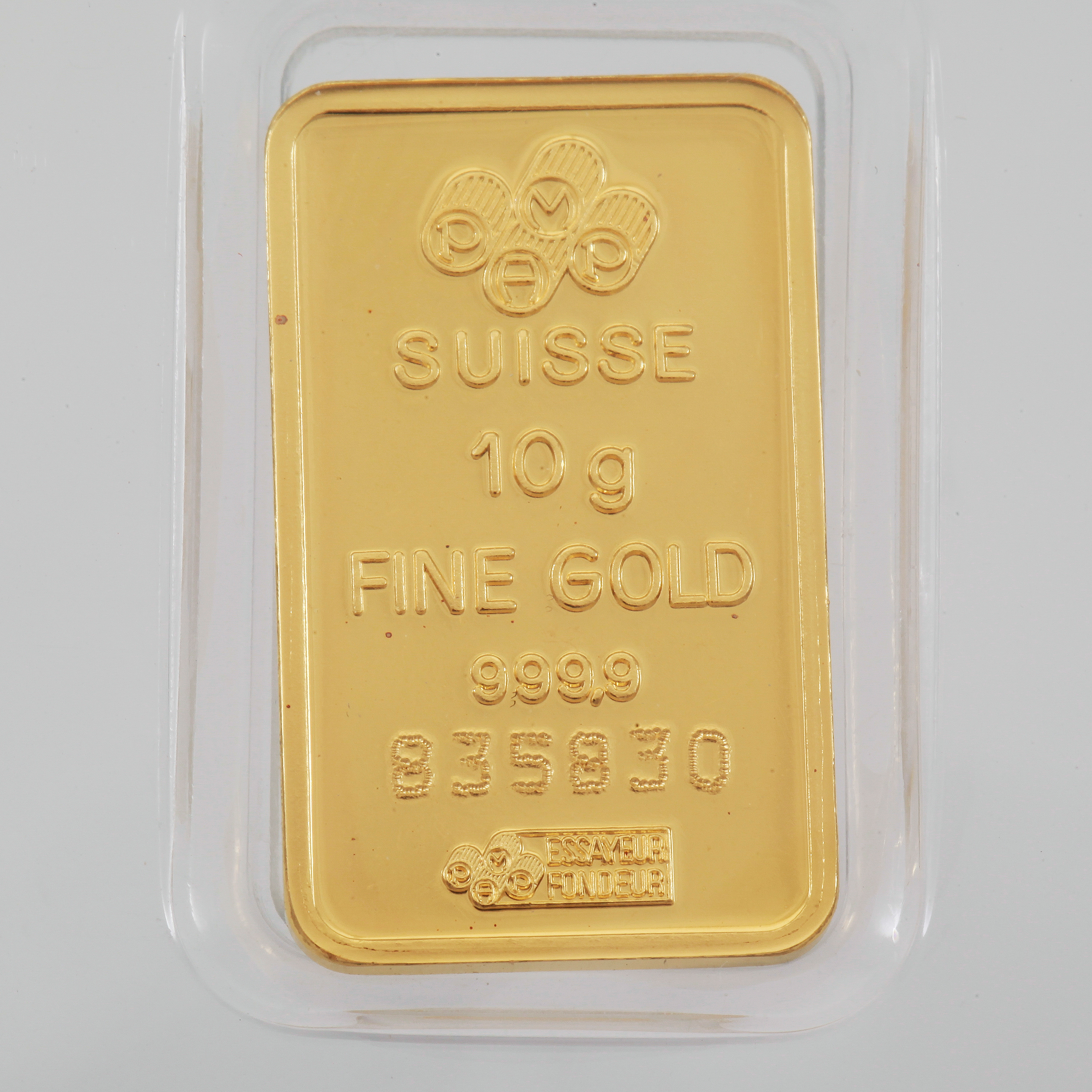 GULDTACKA, finguld, Schweiz. Vikt 10 gram. Bukowskis