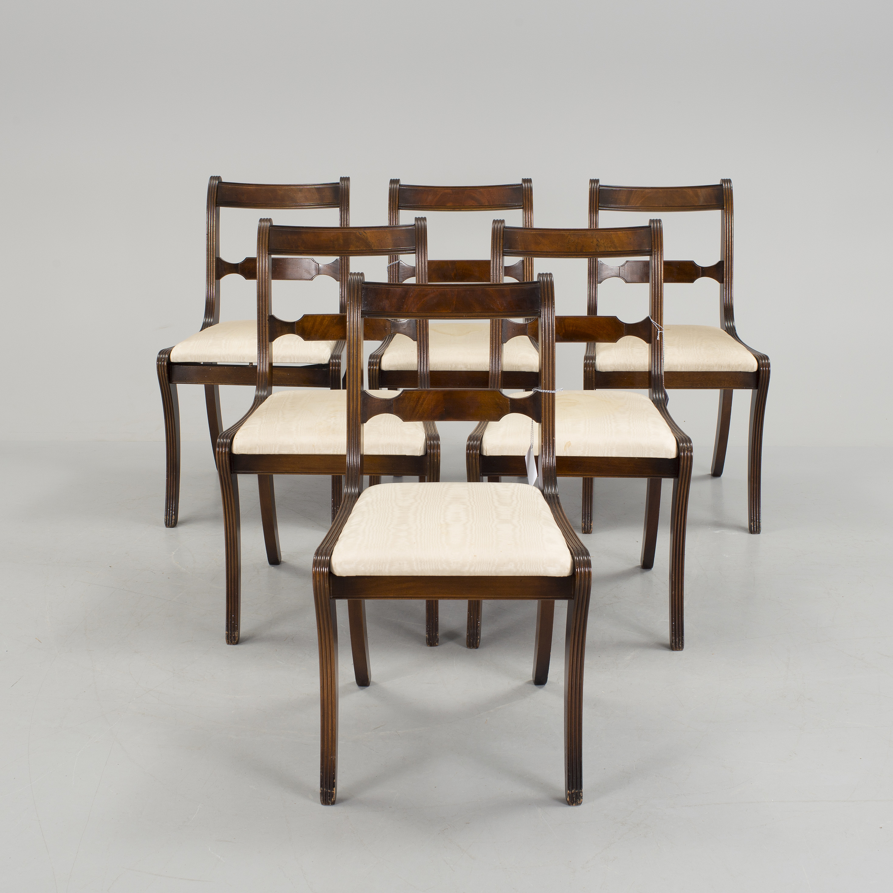 Six mahogany dining chairs from Glenister, High England