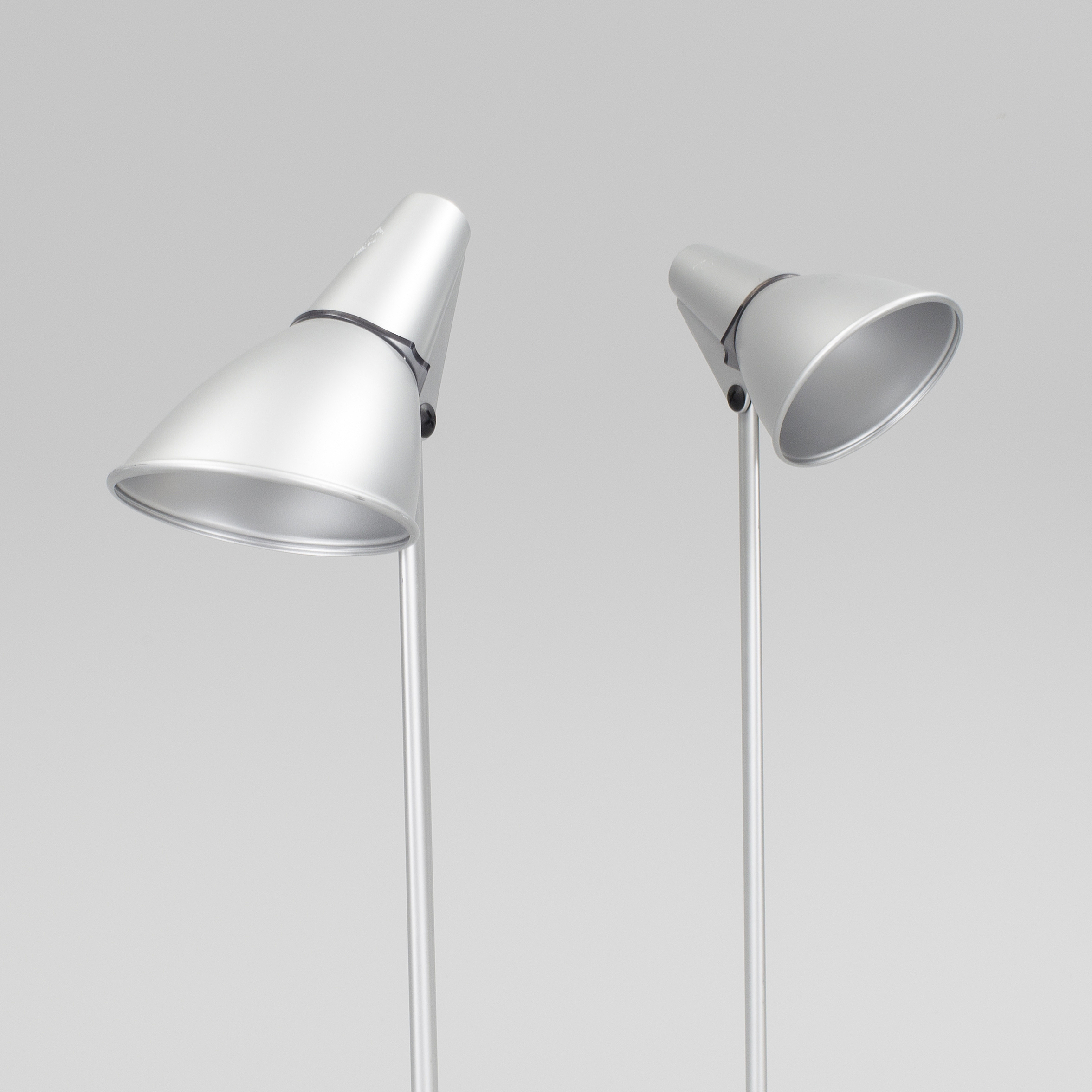 A pair of "Spy" floor lights by Hannes Wettstein for Artemide. Bukowskis