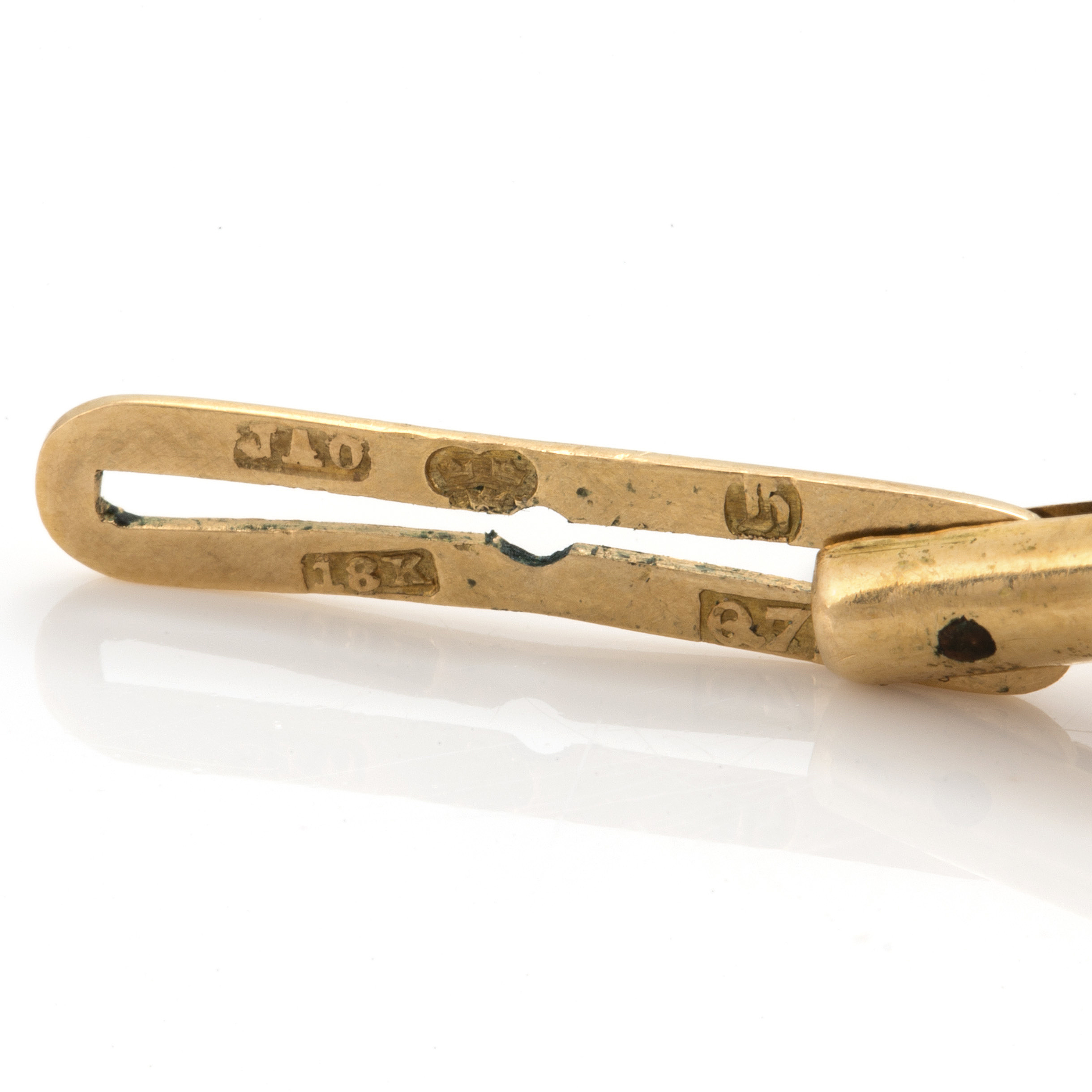 Four 18K gold dress studs. Bukowskis