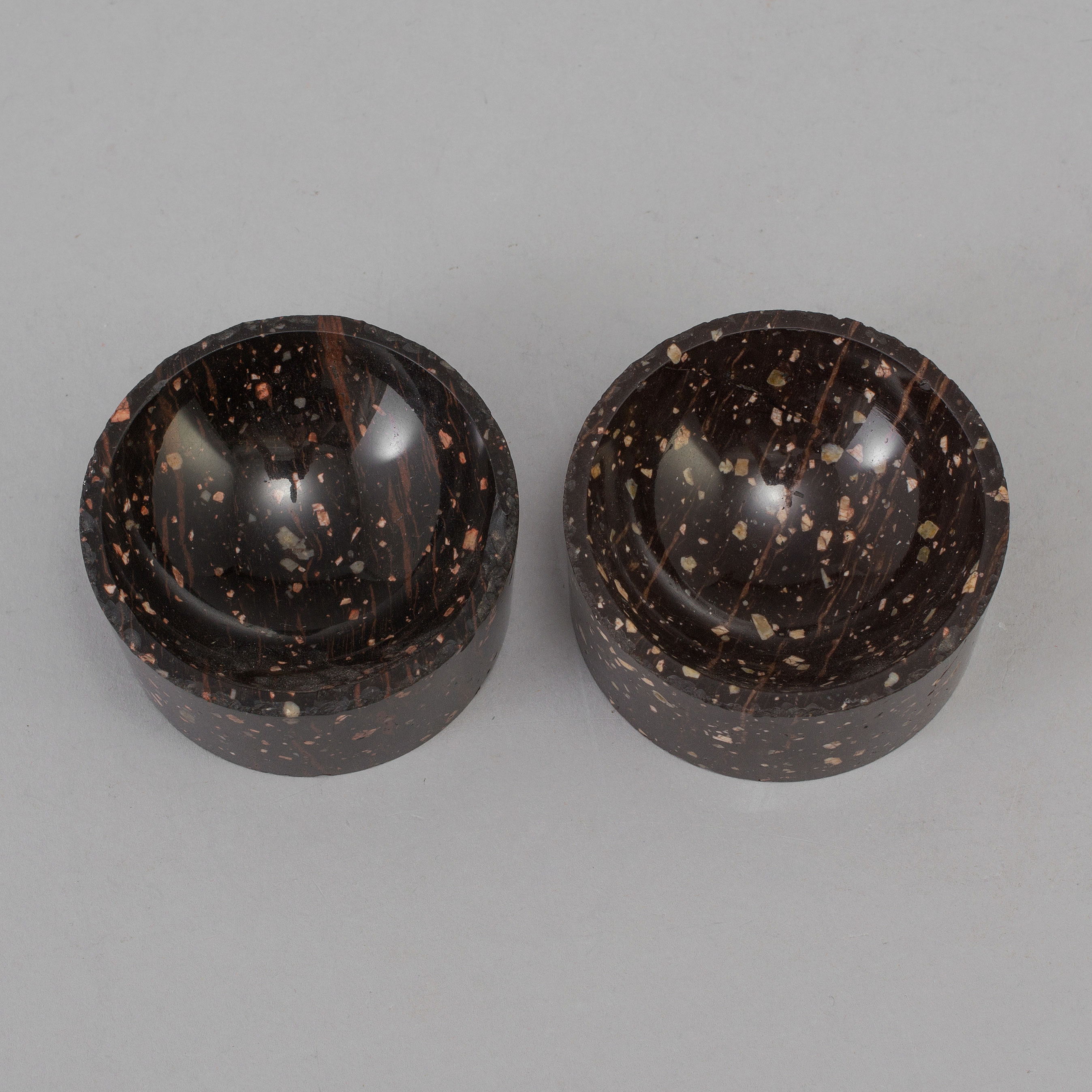Two 19th century porphyry salt bowls. Bukowskis