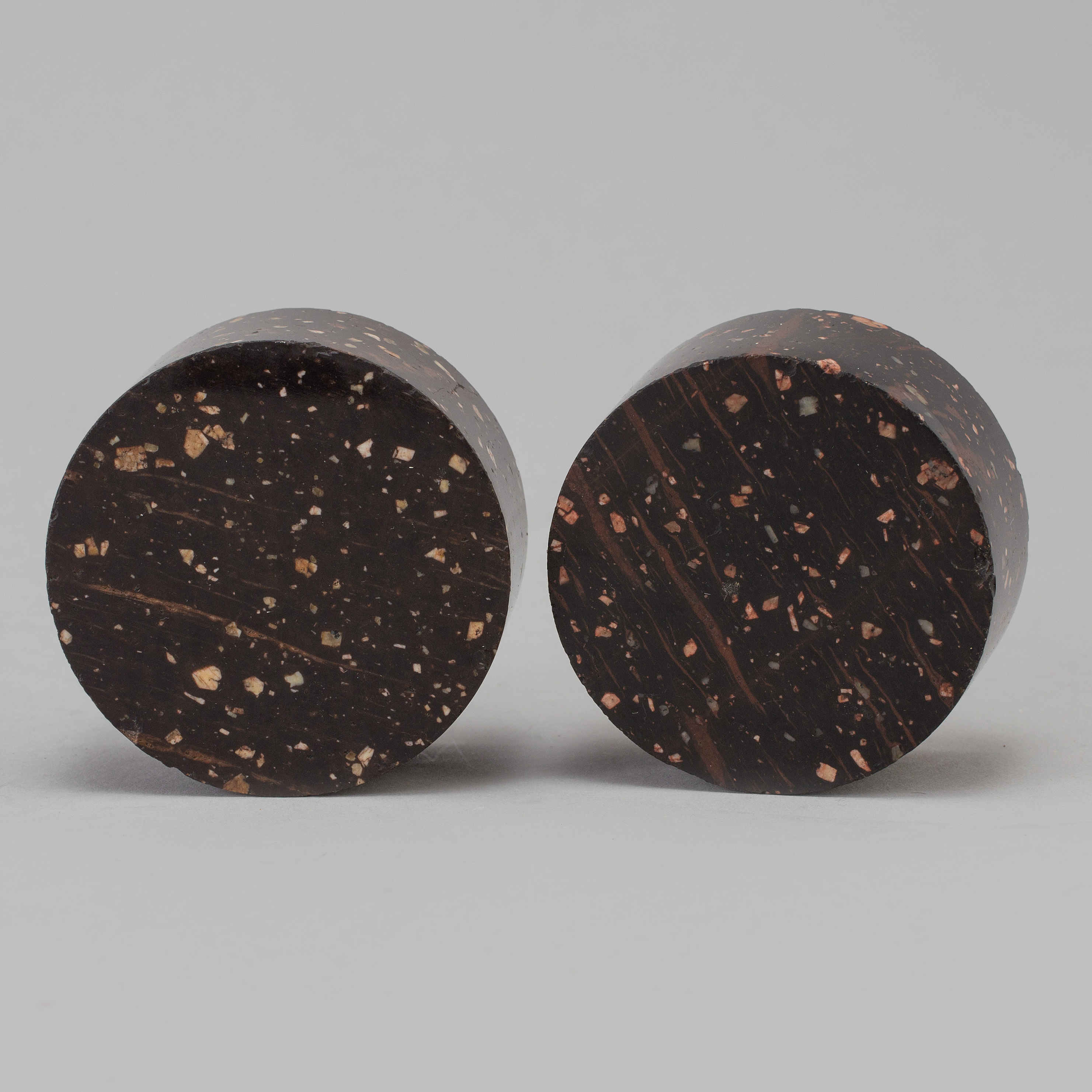 Two 19th century porphyry salt bowls. Bukowskis