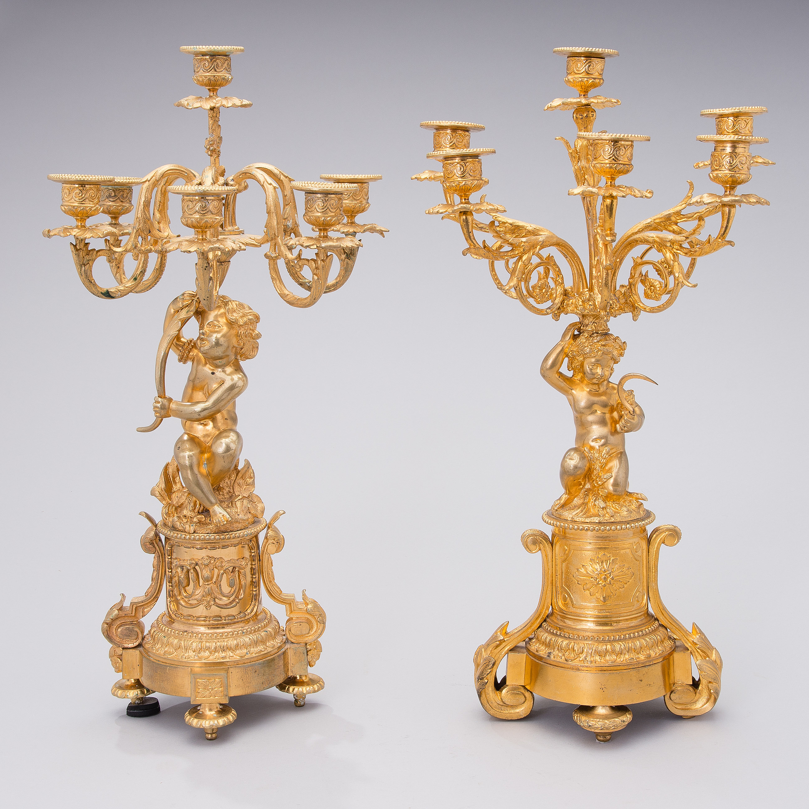 Two similar mid 19th century candelabra in gilt bronze, Bukowskis