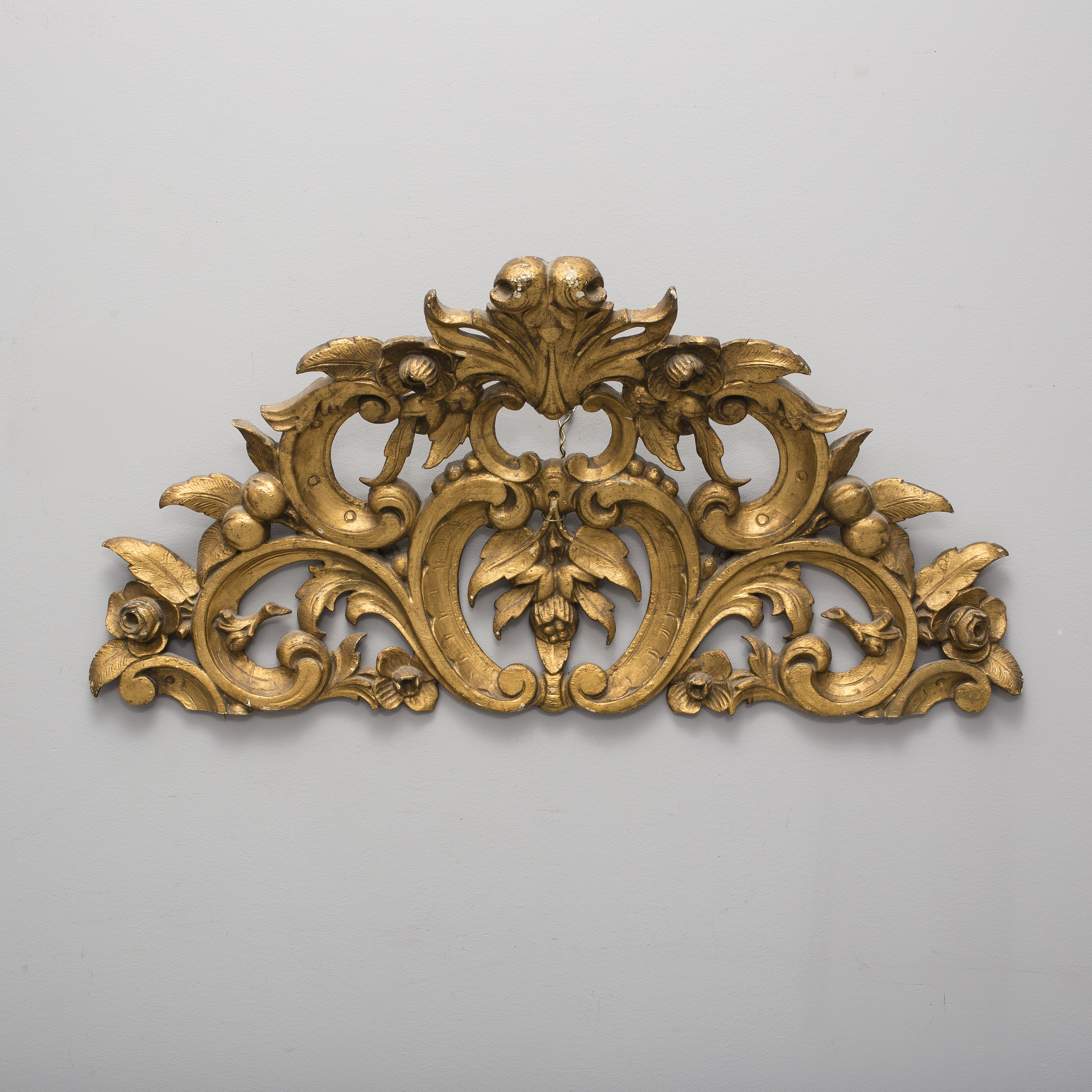 A late 19th century gilt rokoko style carved wooden ornament. Bukowskis