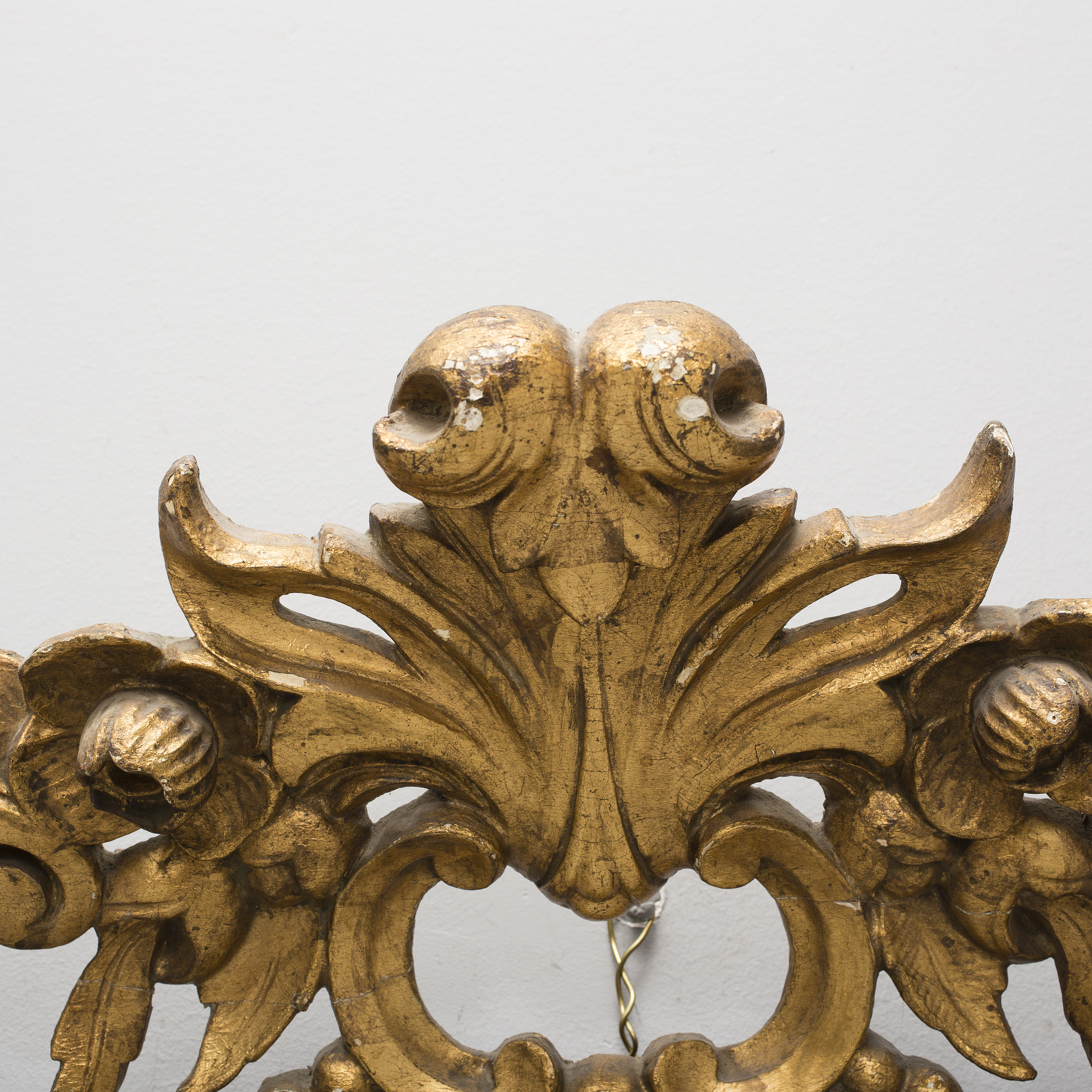 A late 19th century gilt rokoko style carved wooden ornament. Bukowskis