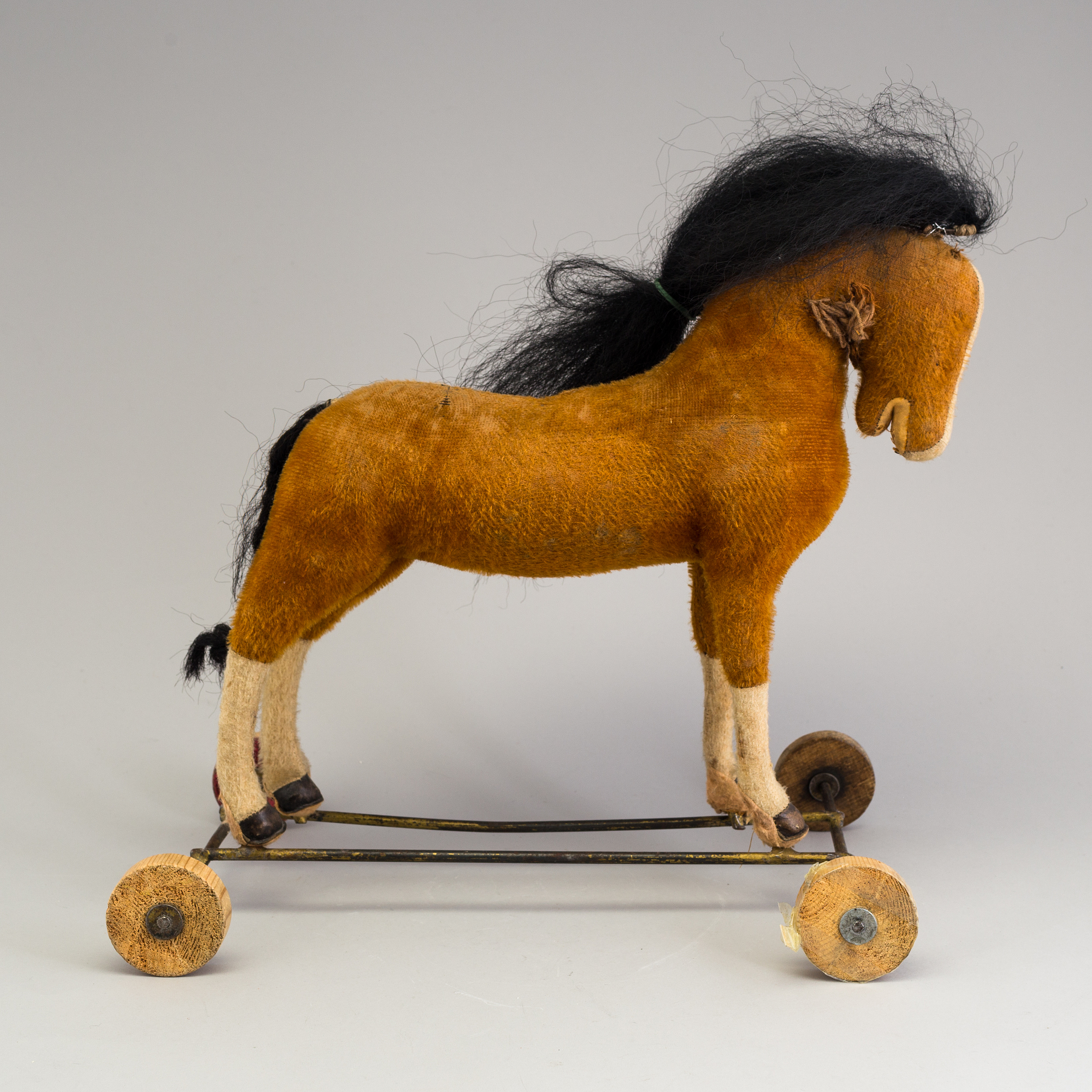 A toy horse on wheels, early 20th century. Bukowskis