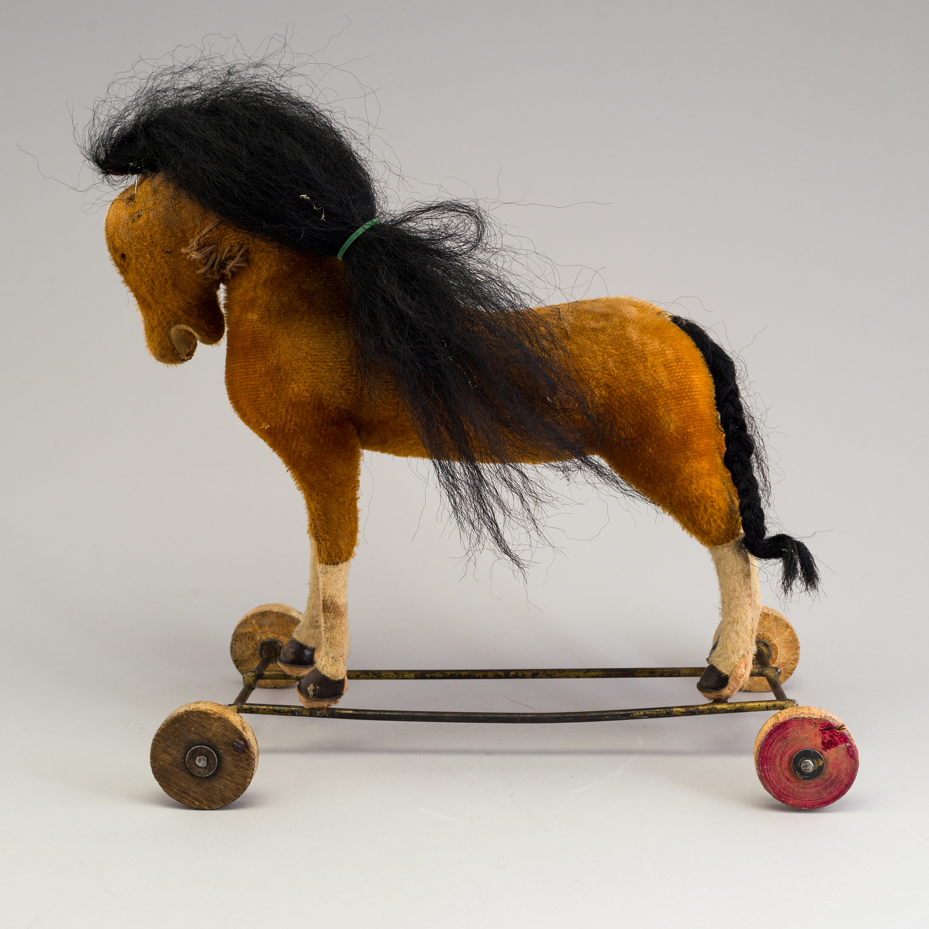 A toy horse on wheels, early 20th century. Bukowskis