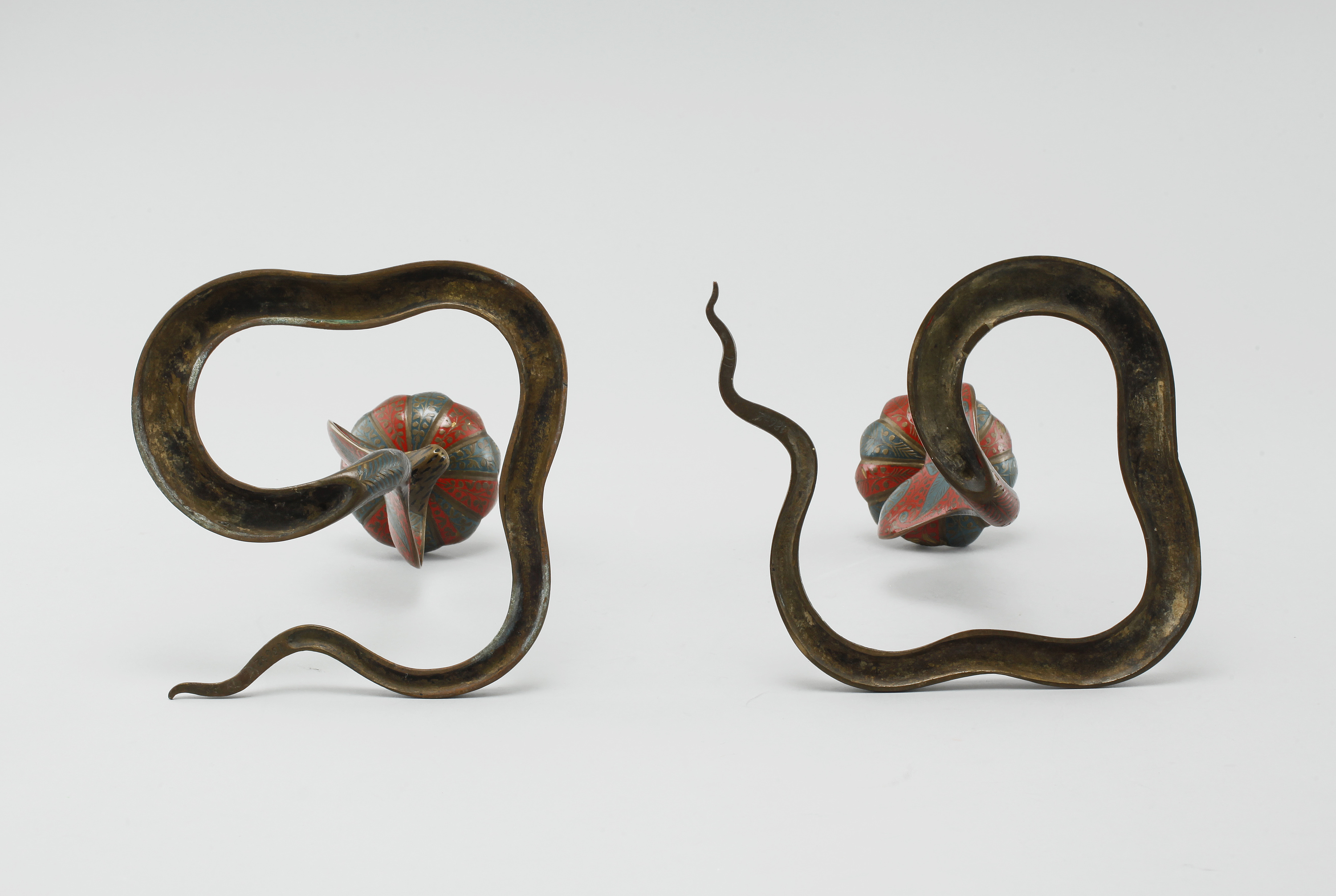 A Pair Of Candle Sticks With Similar Decor First Half Of The 20th a-pair-of-candle-sticks-with-similar-decor-first-half-of-the-20th