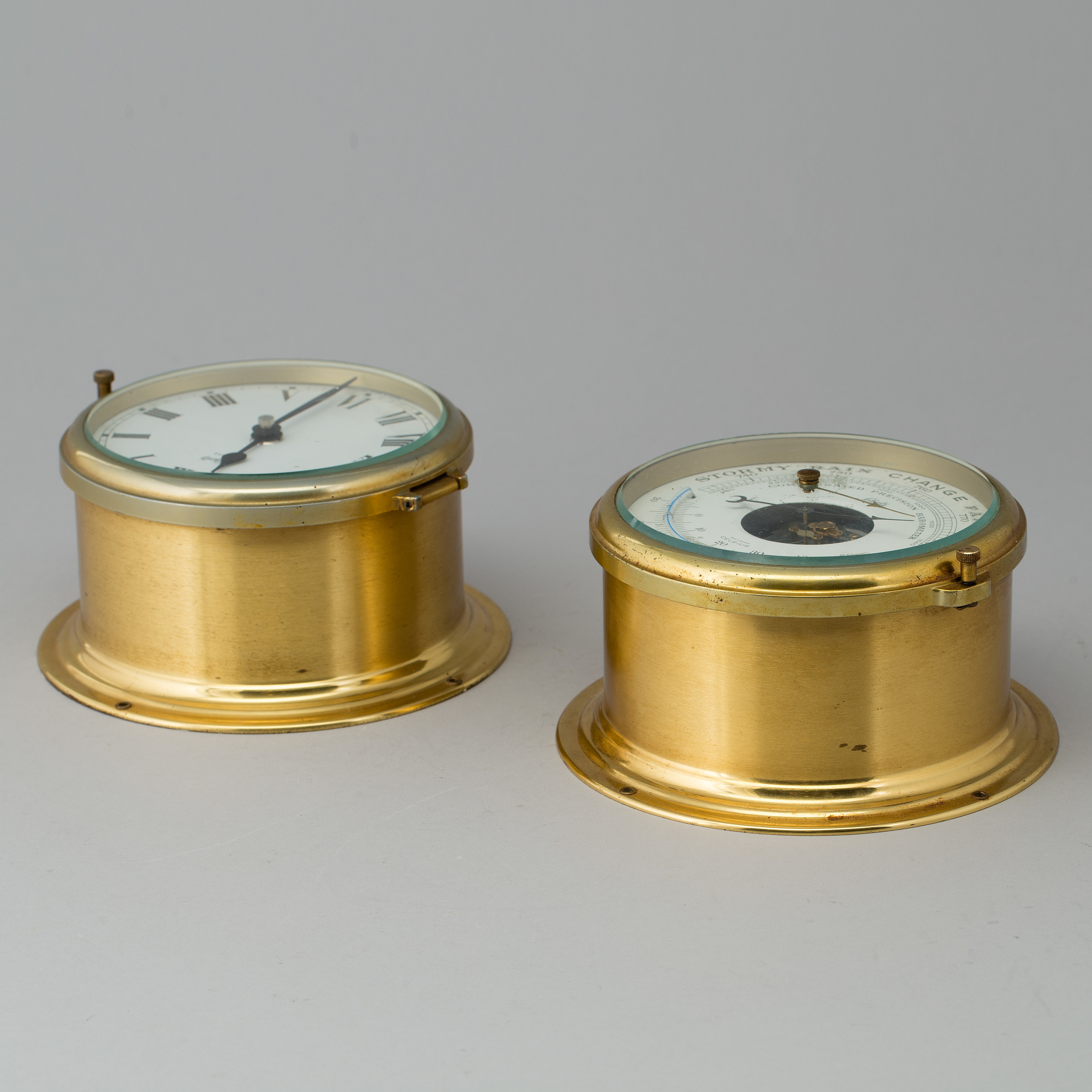 A brass barometer and clock, Schatz, 20th century. Bukowskis