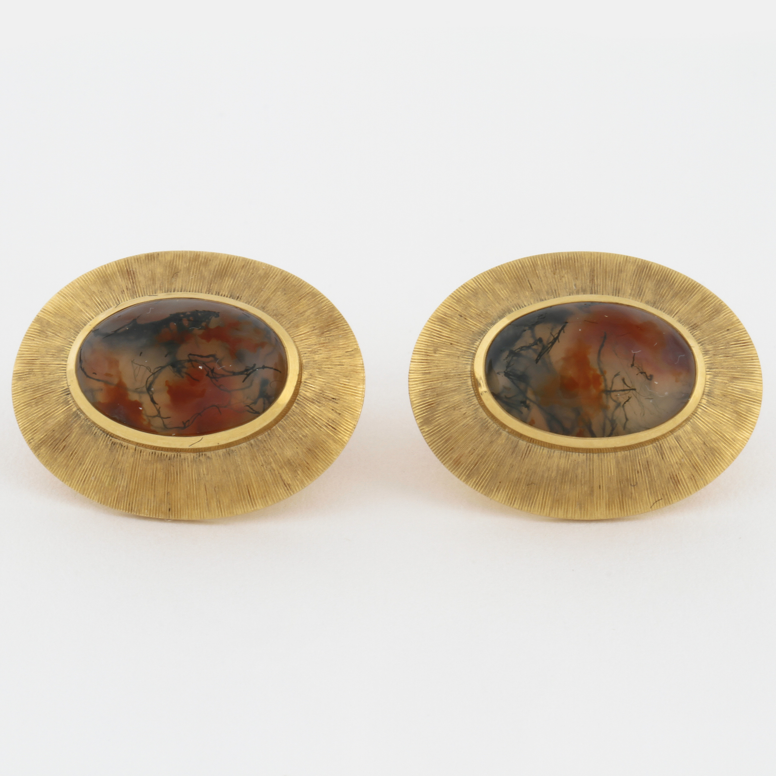 A pair off moss agate cufflinks byC E Carlman, Stockholm, 1977. Bukowskis