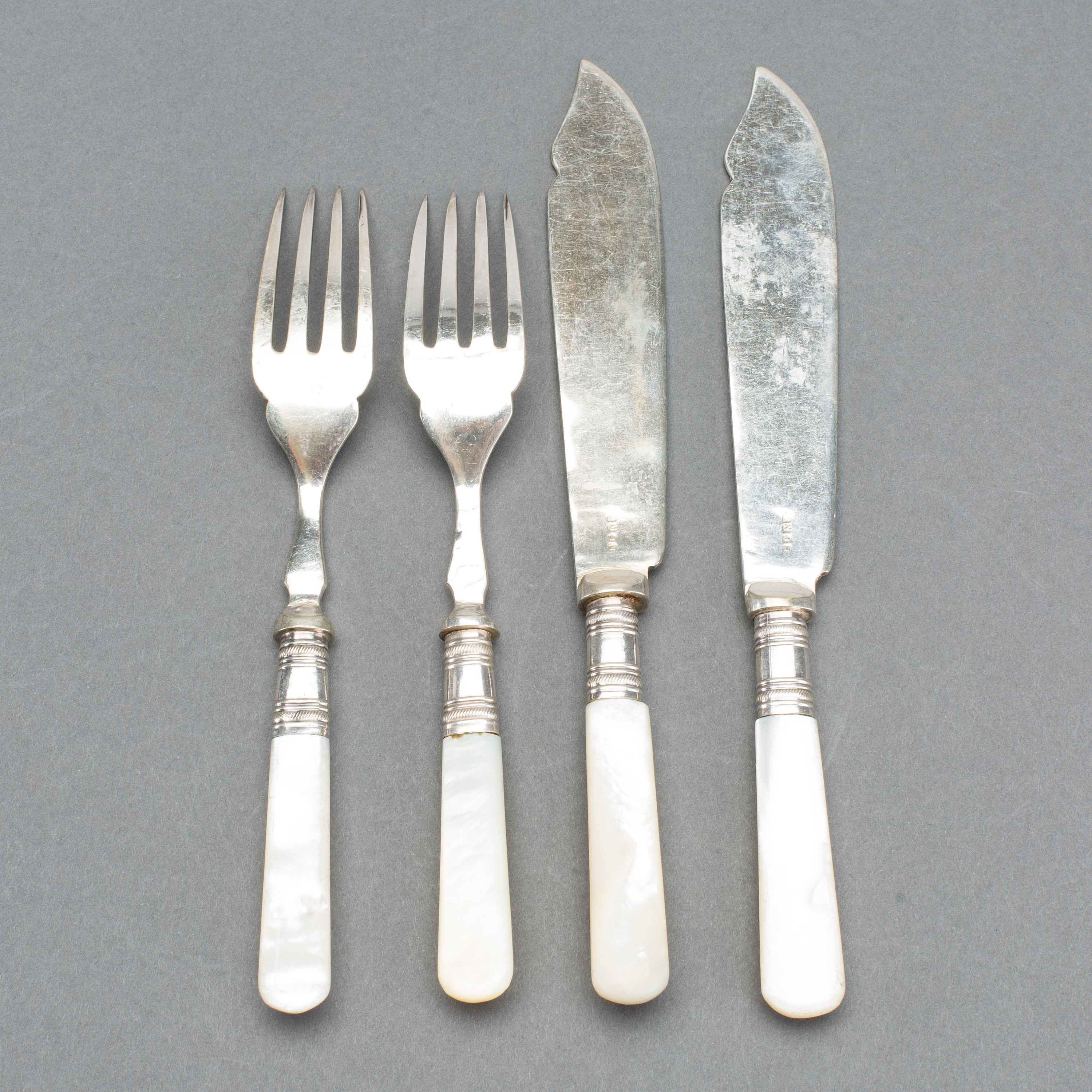 A set of 24 pcs plate cutlery around 1900. Bukowskis