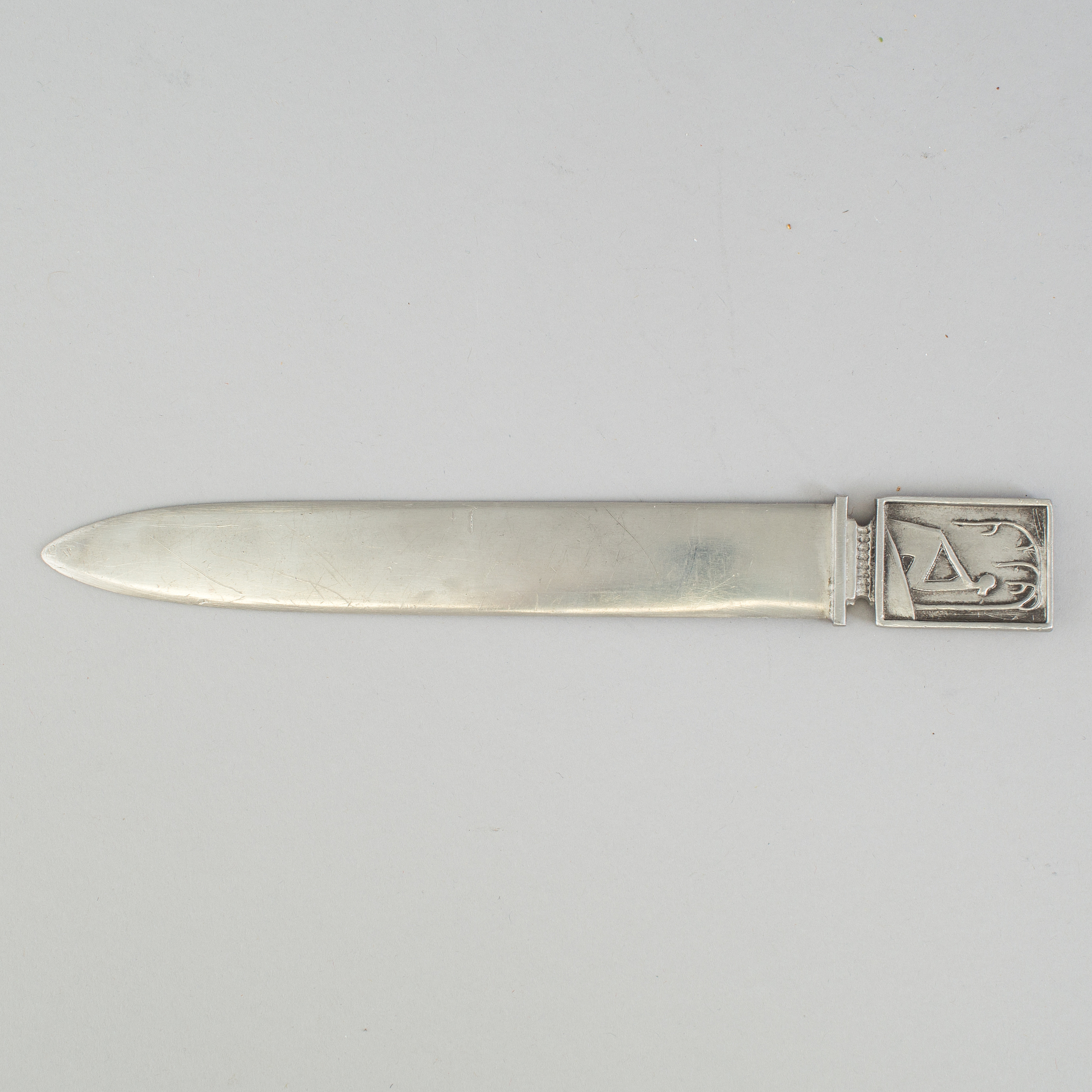 A art deco pewter Letter knife from CG Hallberg. Bukowskis