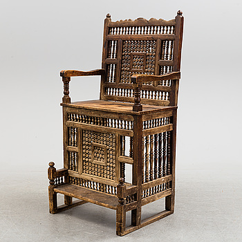 A wooden chair, 19th century.