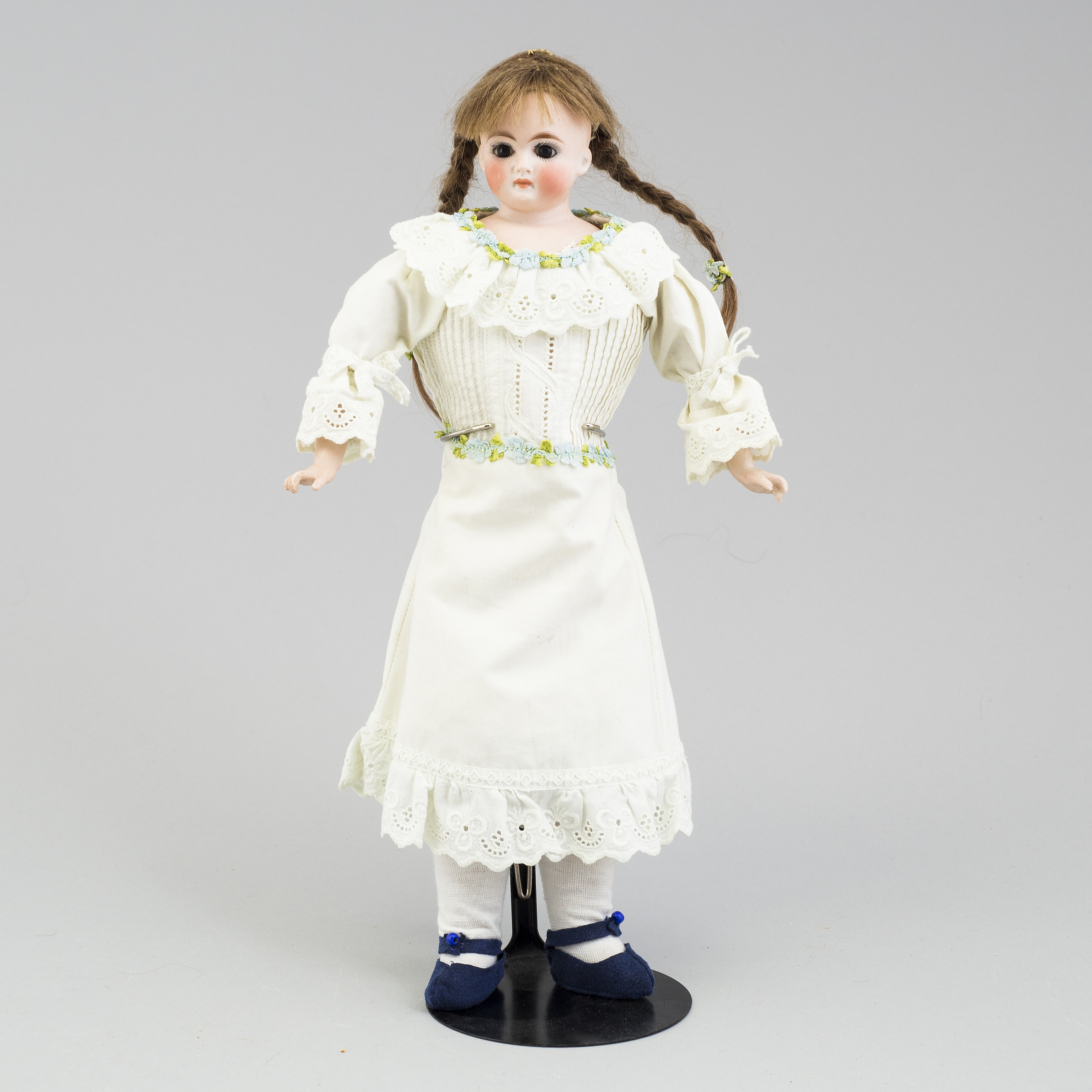 a German porcelain doll from the early 20th century. Bukowskis