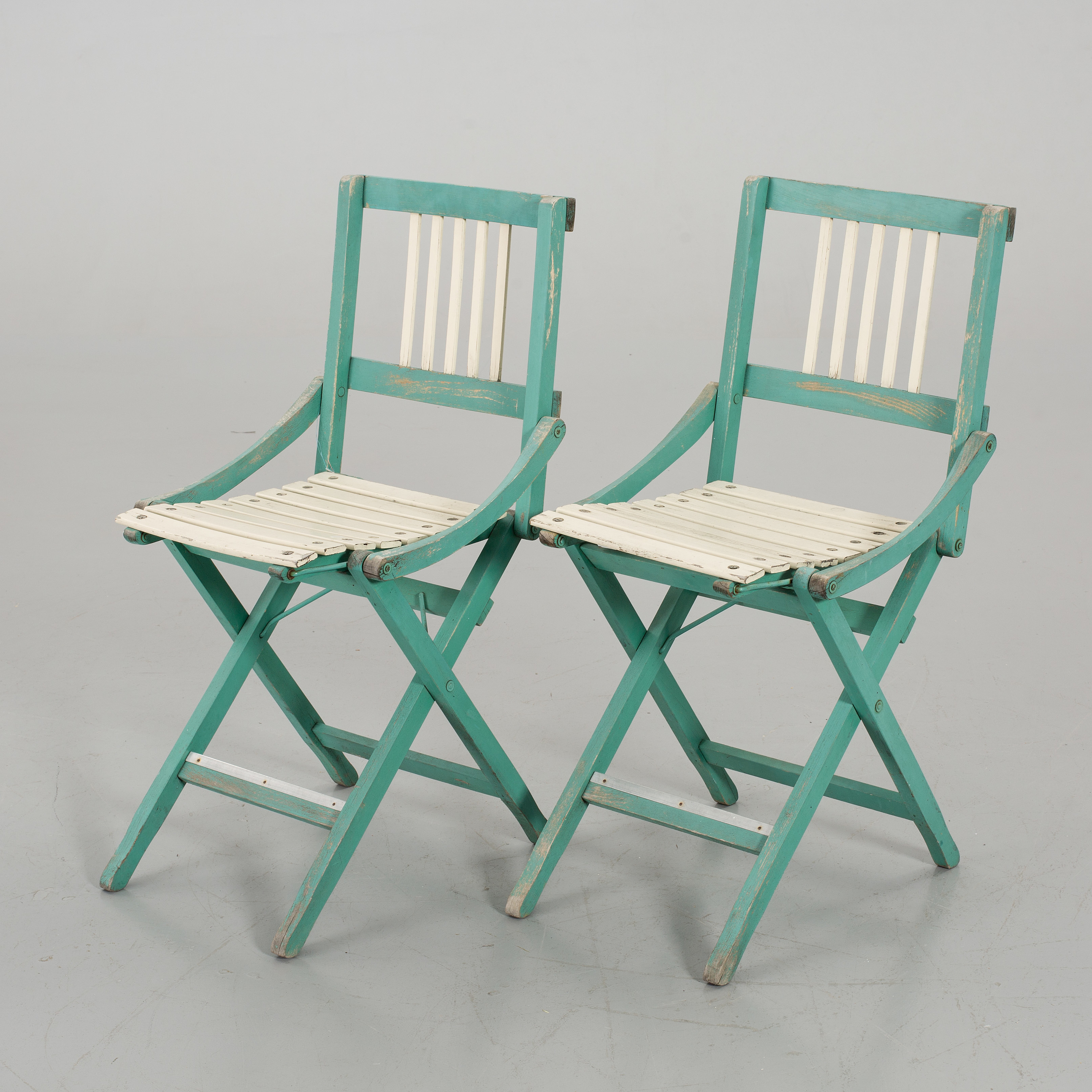 A PAIR OF FOLDING CHAIRS BY FRATELLI REGUITTI, Italy, middle of the