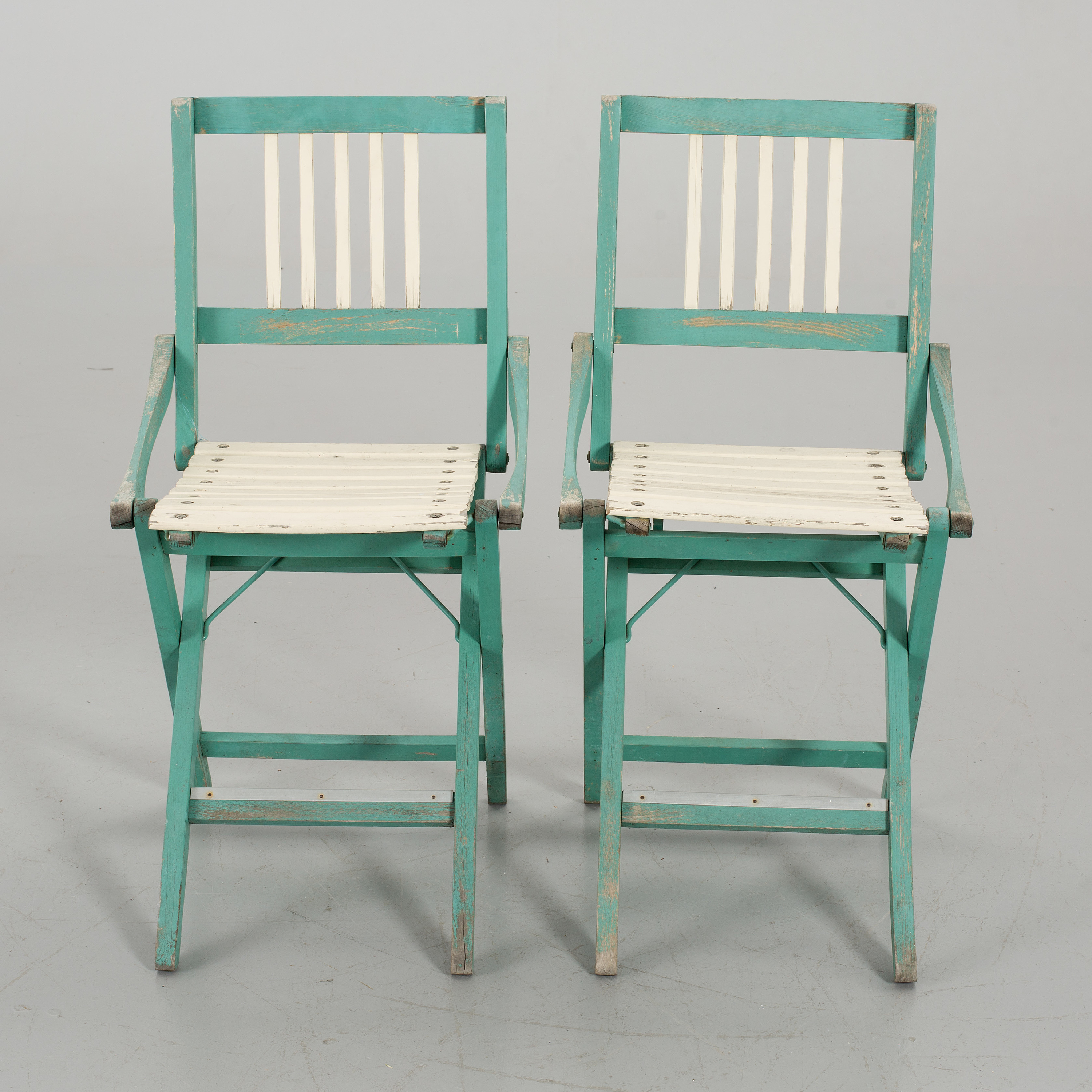 A PAIR OF FOLDING CHAIRS BY FRATELLI REGUITTI, Italy, middle of the