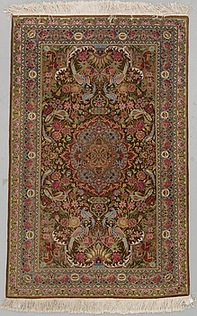 A persian rug. Around 157 x 101 cm.