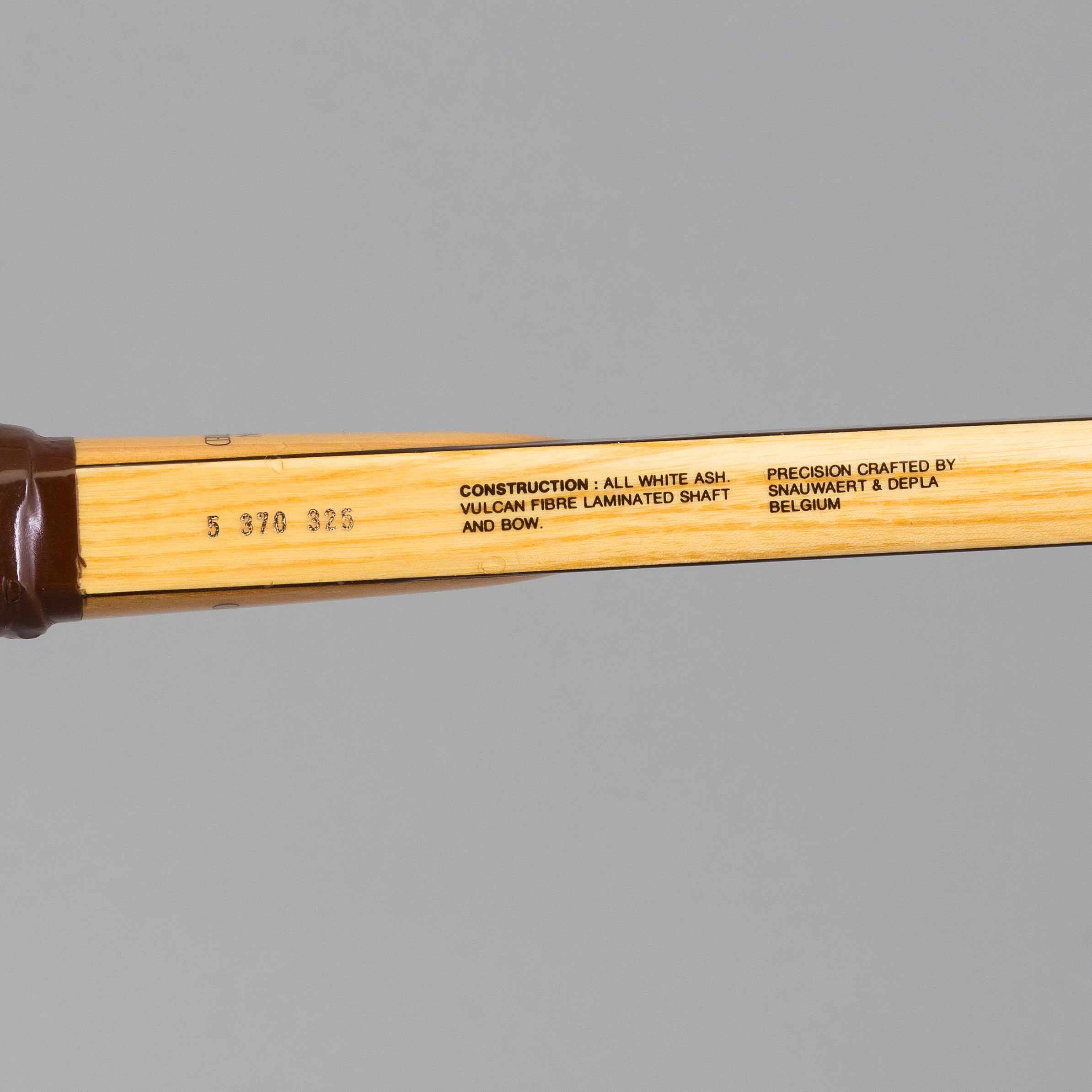 All white ash vulcan fibre laminated shaft and bow tennis racket. Brian