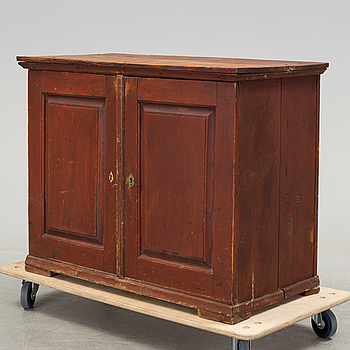 A first half of the 19th century pine folk art cabinet, markt 1831.