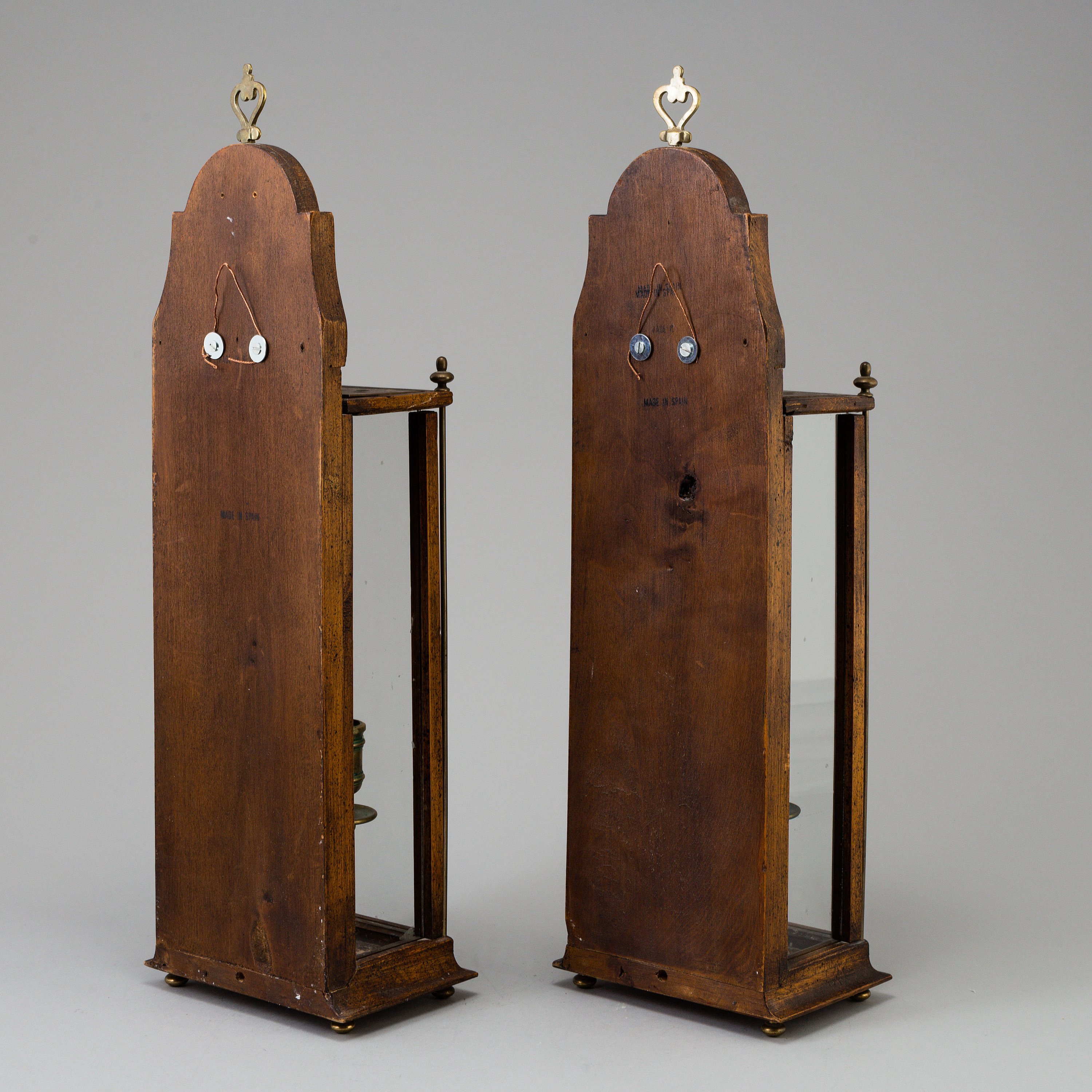 A pair of encased wall or table candelabras, Spain. Bukowskis