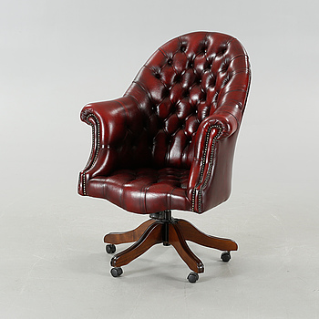 A late 20th century leather office chair.