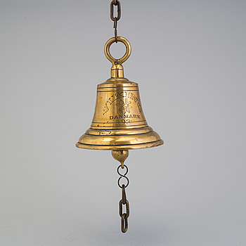 A brass ship bell, Denmark, dated 1932.