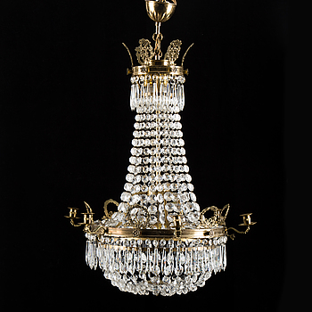 A Gustavian style chandelier först part of the 20th century.