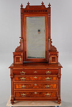 A chest of drawers with mirror, late 19th century.