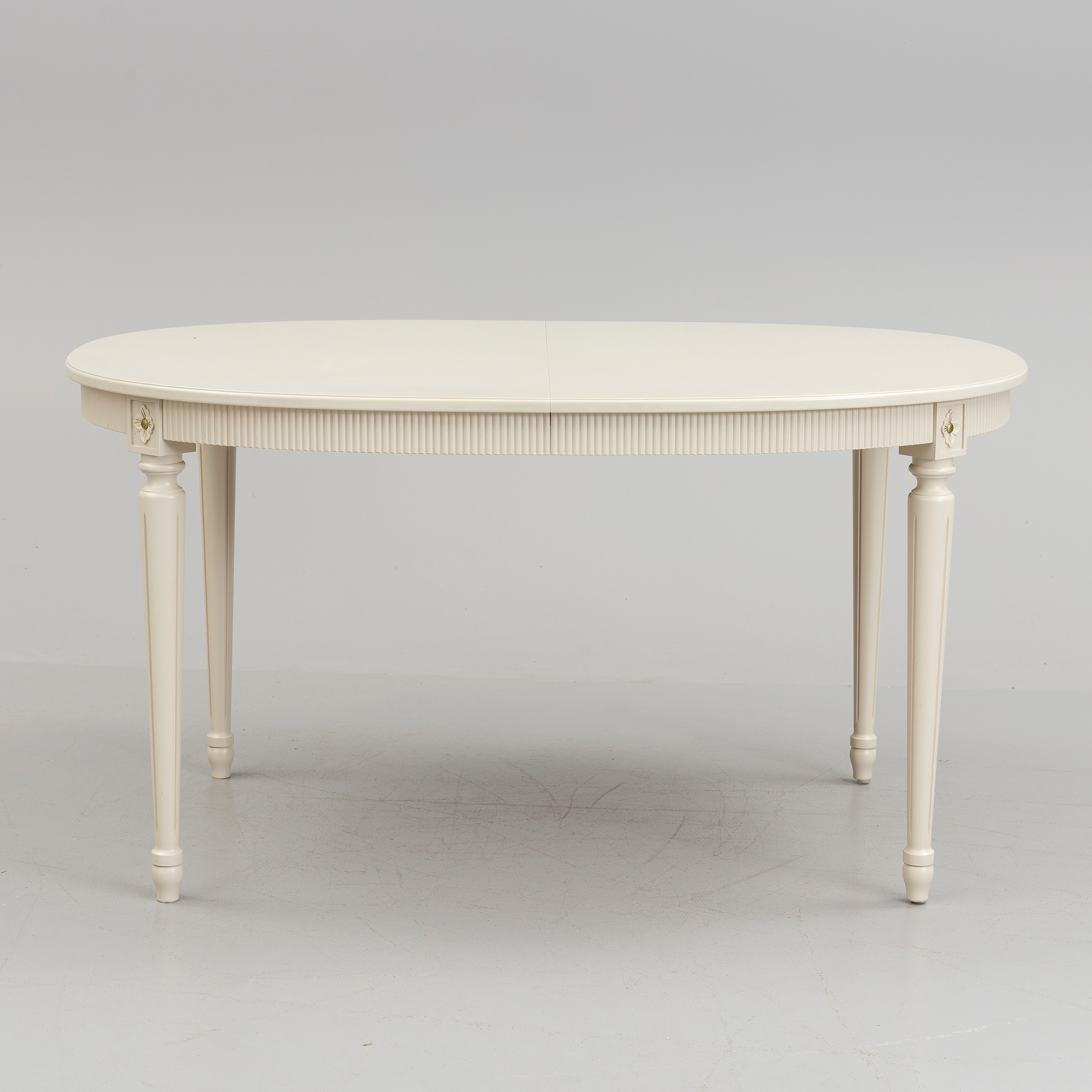 A 20th century Swedish Gustavian style dining table. Bukowskis