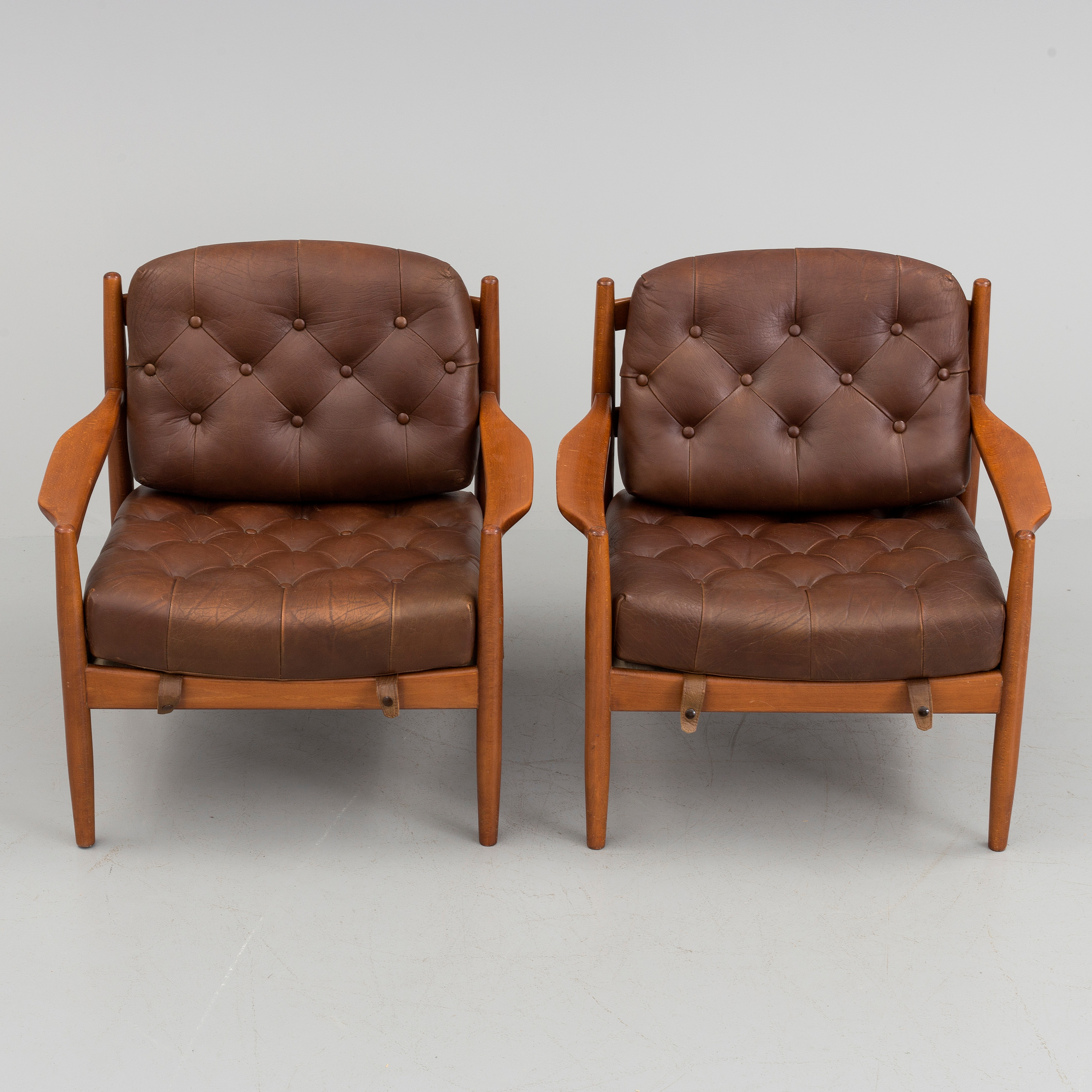 A Pair Of L ck Easy Chairs By Ingemar Thillmark OPE Bukowskis a-pair-of-l-ck-easy-chairs-by-ingemar-thillmark-ope-bukowskis