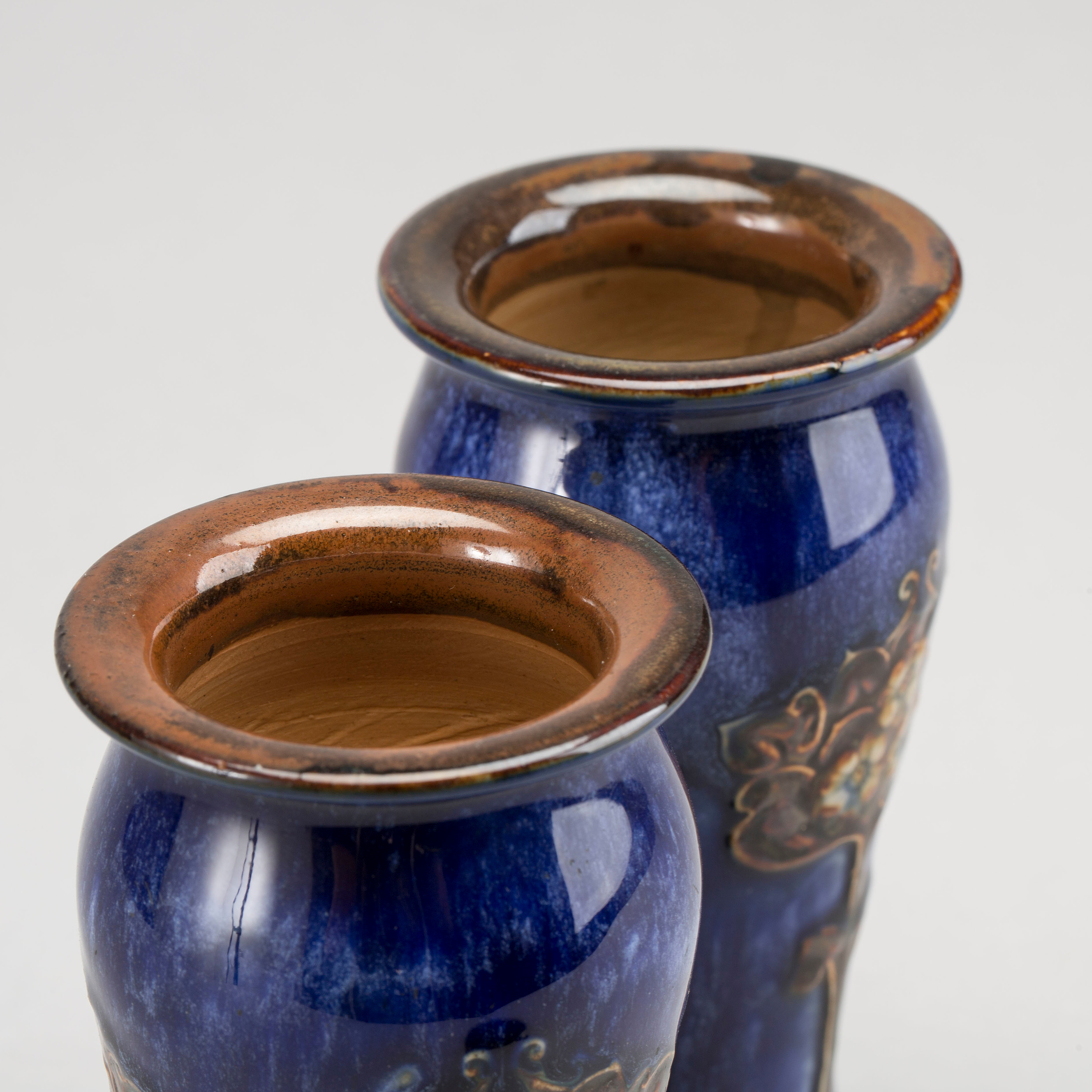 A Pair of Royal Doulton earthenware vases, early 1900's. Bukowskis