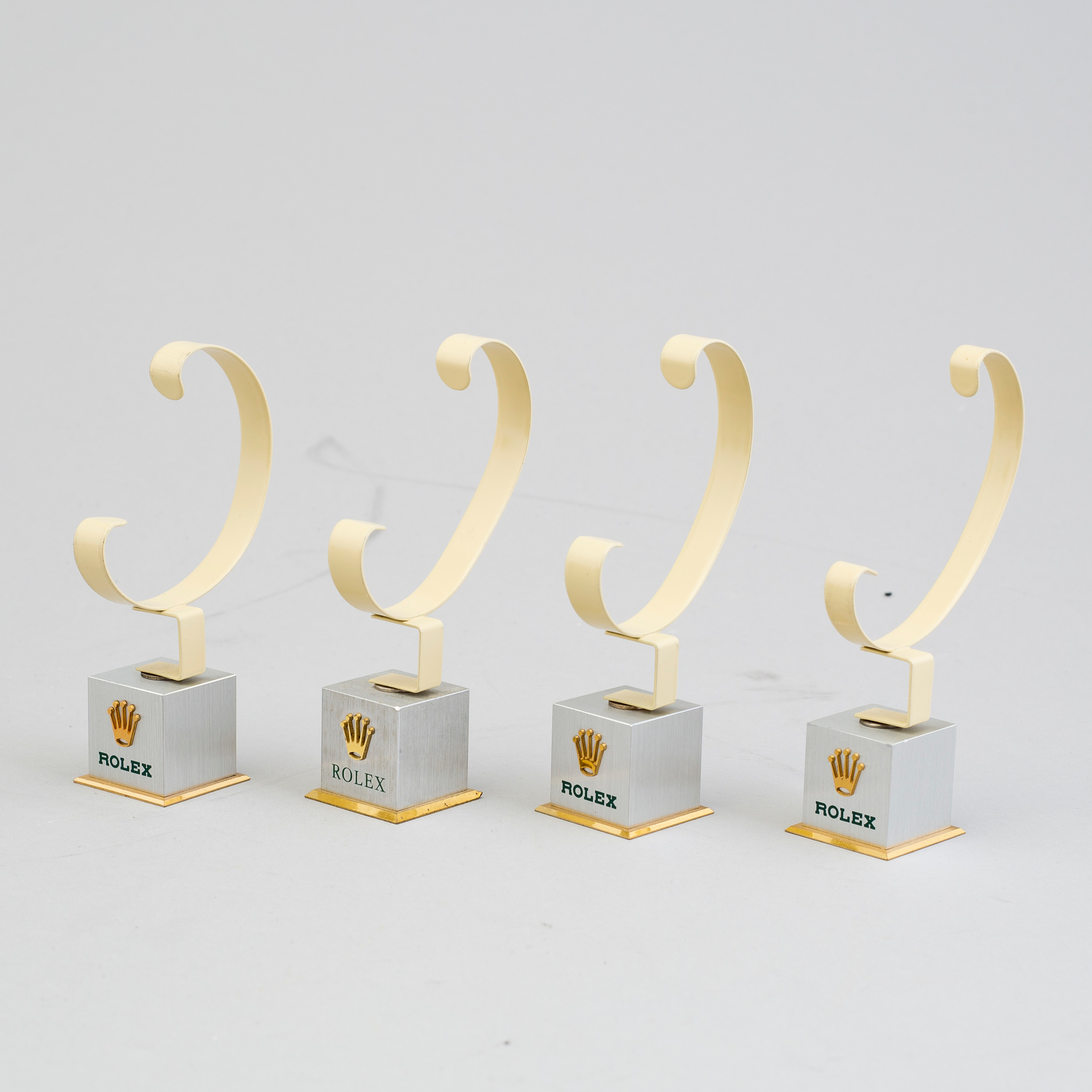 Rolex, Four watch display stands. Bukowskis