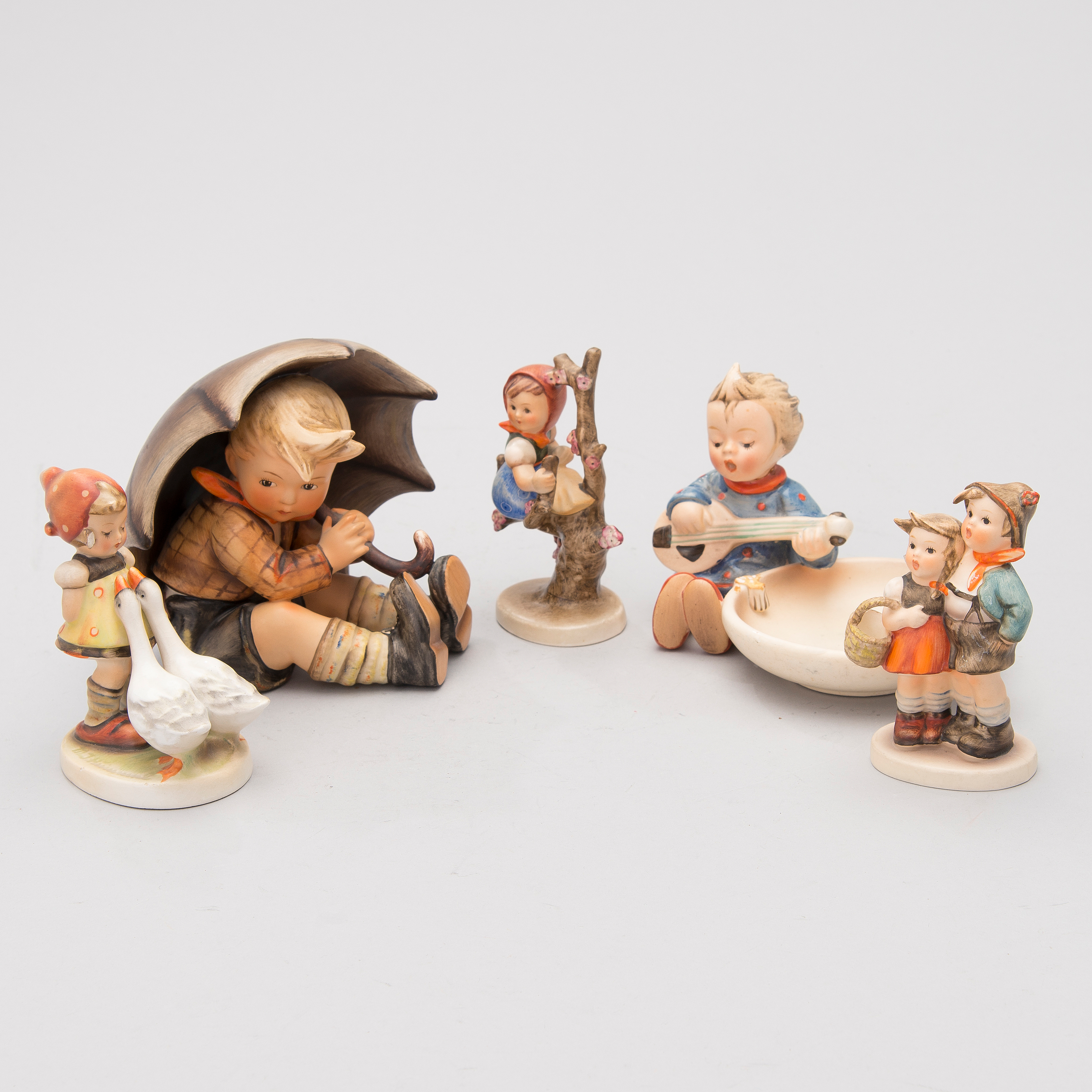 Five porcelain figurines from M.I. Hummel, Goebel, Germany 1950s1970s