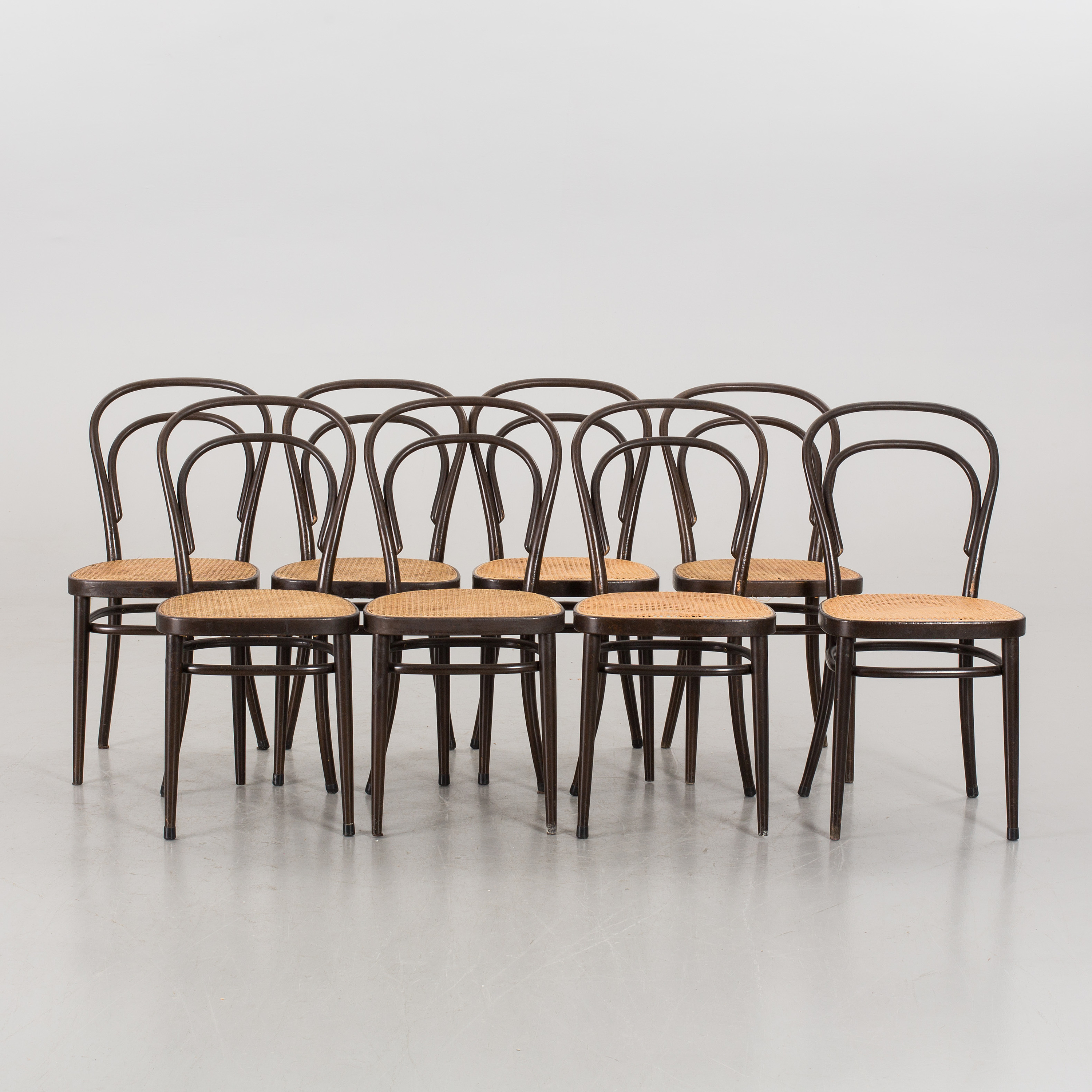 A set of 8 chairs from 1979. Bukowskis